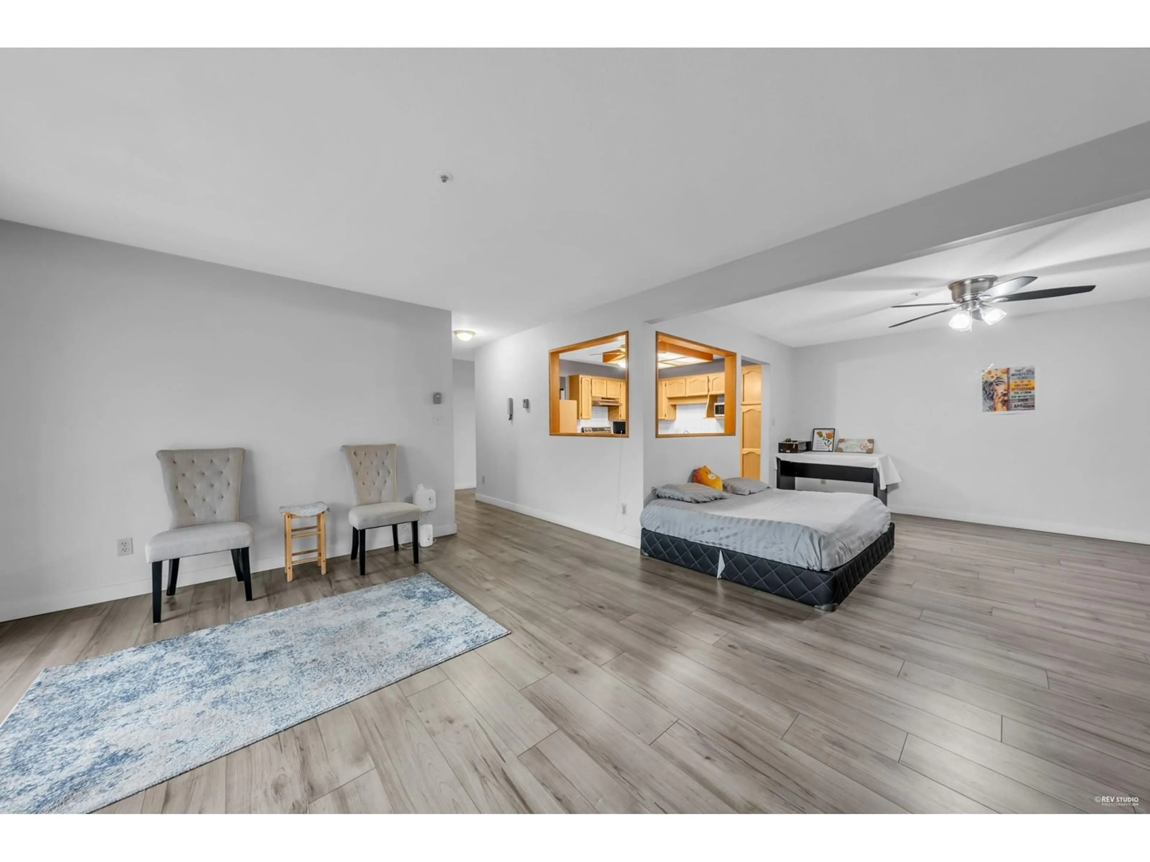 A pic of a room, wood floors for 203 5377 201A STREET, Langley British Columbia V3A1S7