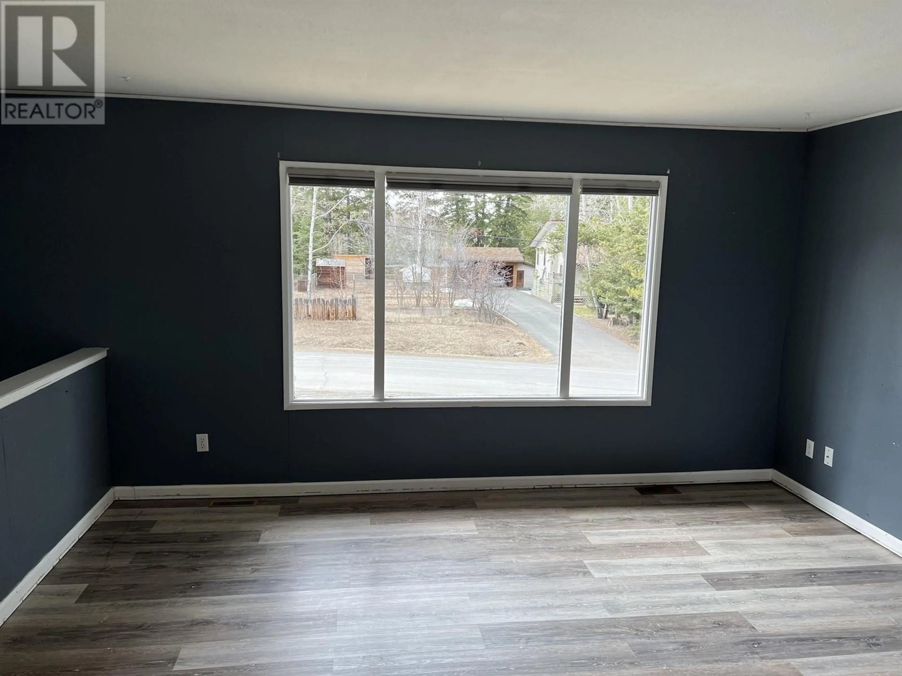 A pic of a room, wood floors for 835 SPRUCE AVENUE, 100 Mile House British Columbia V0K2E0