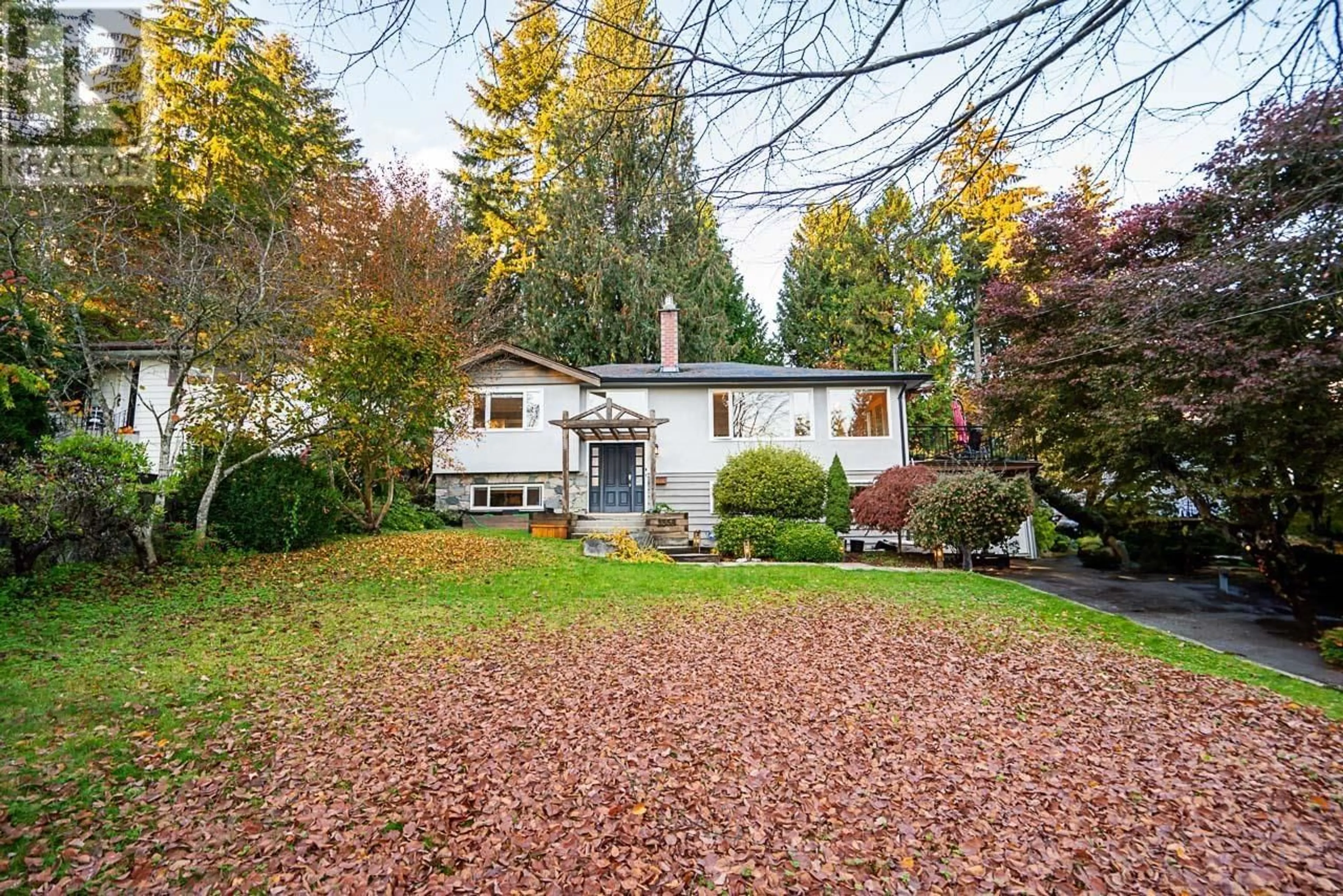 Frontside or backside of a home, the fenced backyard for 1358 E 14TH STREET, North Vancouver British Columbia V7J1K4