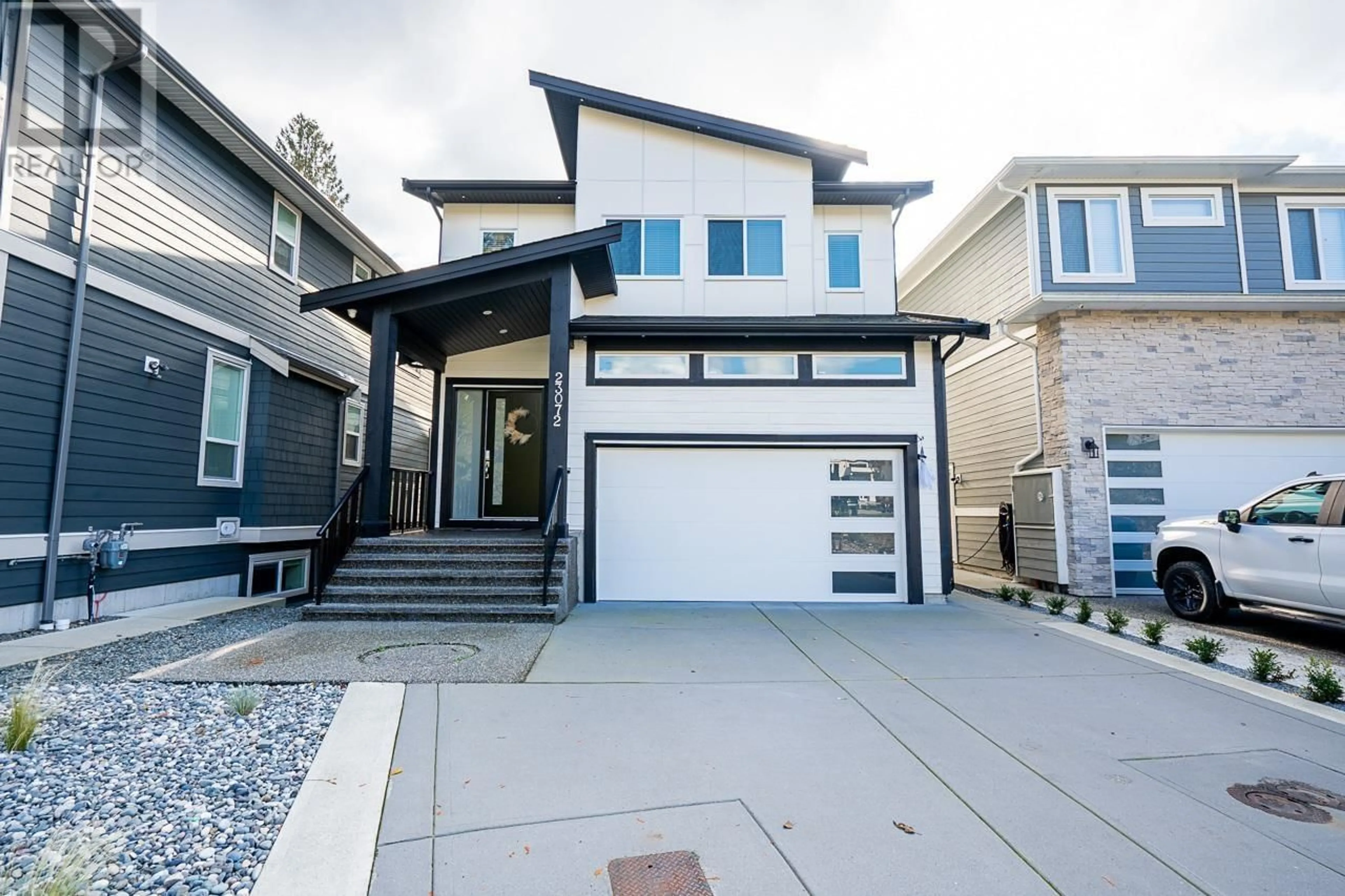 Frontside or backside of a home, the street view for 23072 134 LOOP, Maple Ridge British Columbia V4R0E6