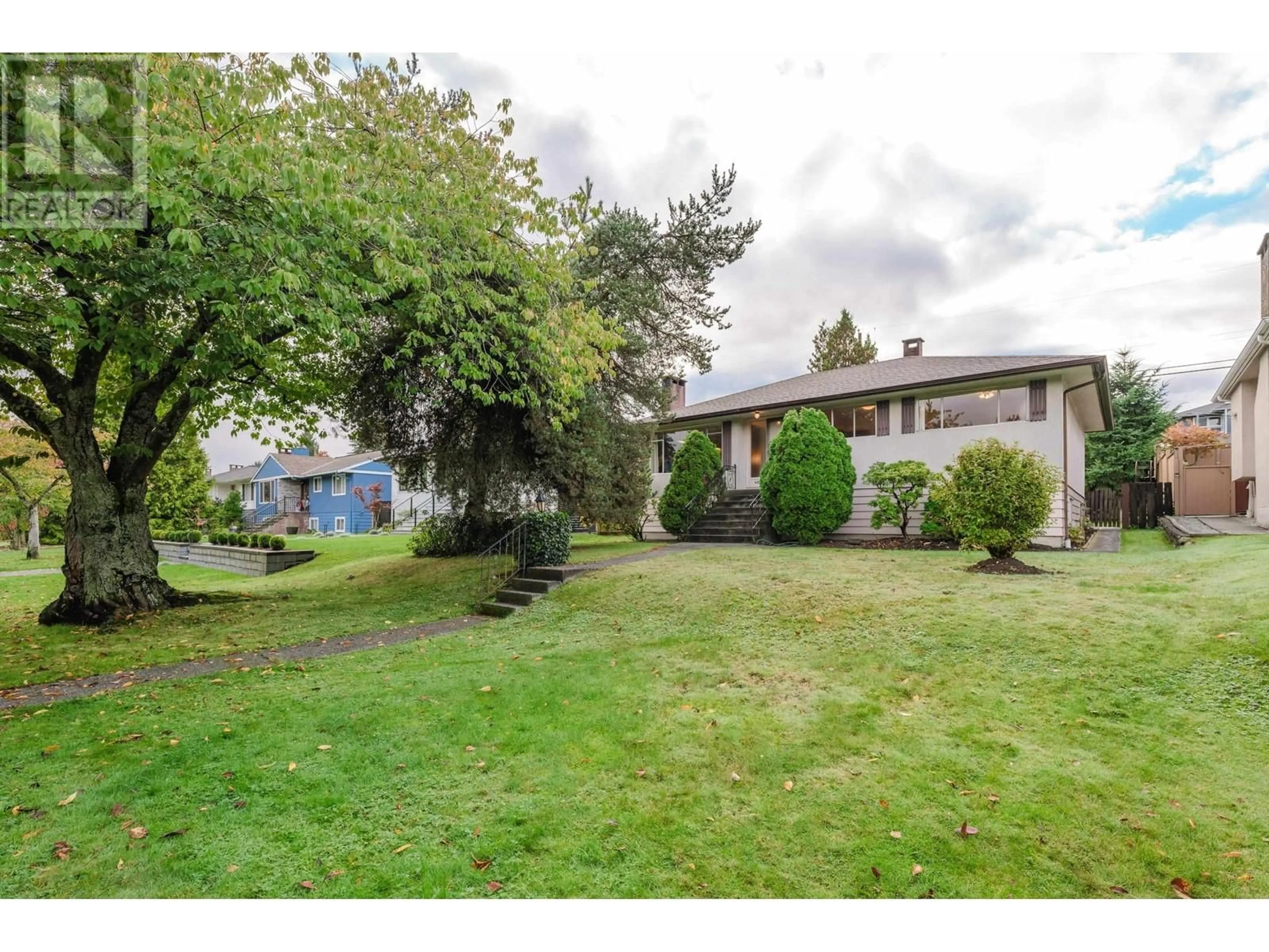 Frontside or backside of a home, the fenced backyard for 4830 WESTLAWN DRIVE, Burnaby British Columbia V5C3R3