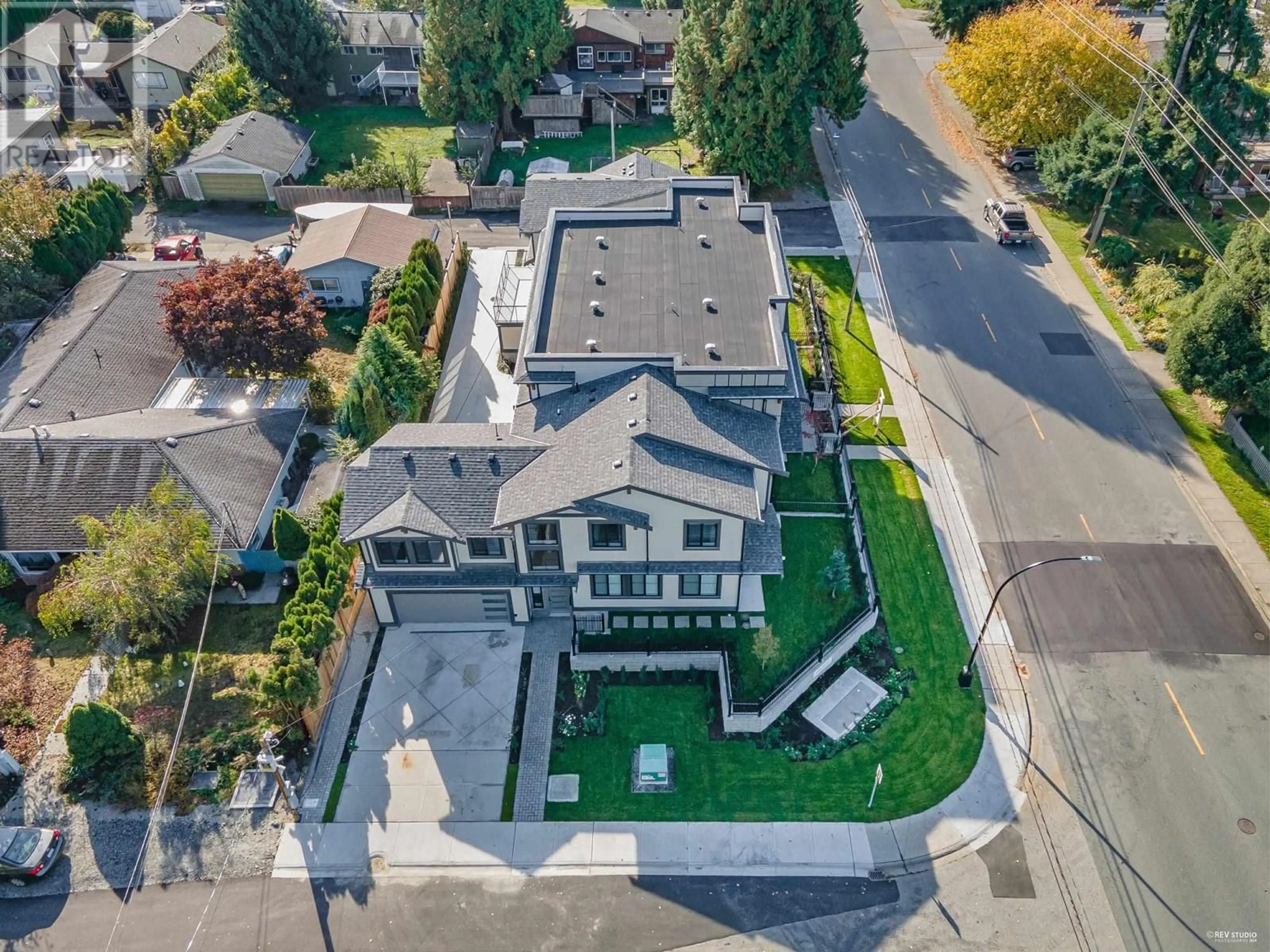 Frontside or backside of a home, the street view for 1 11384 207TH STREET, Maple Ridge British Columbia V2X1W6