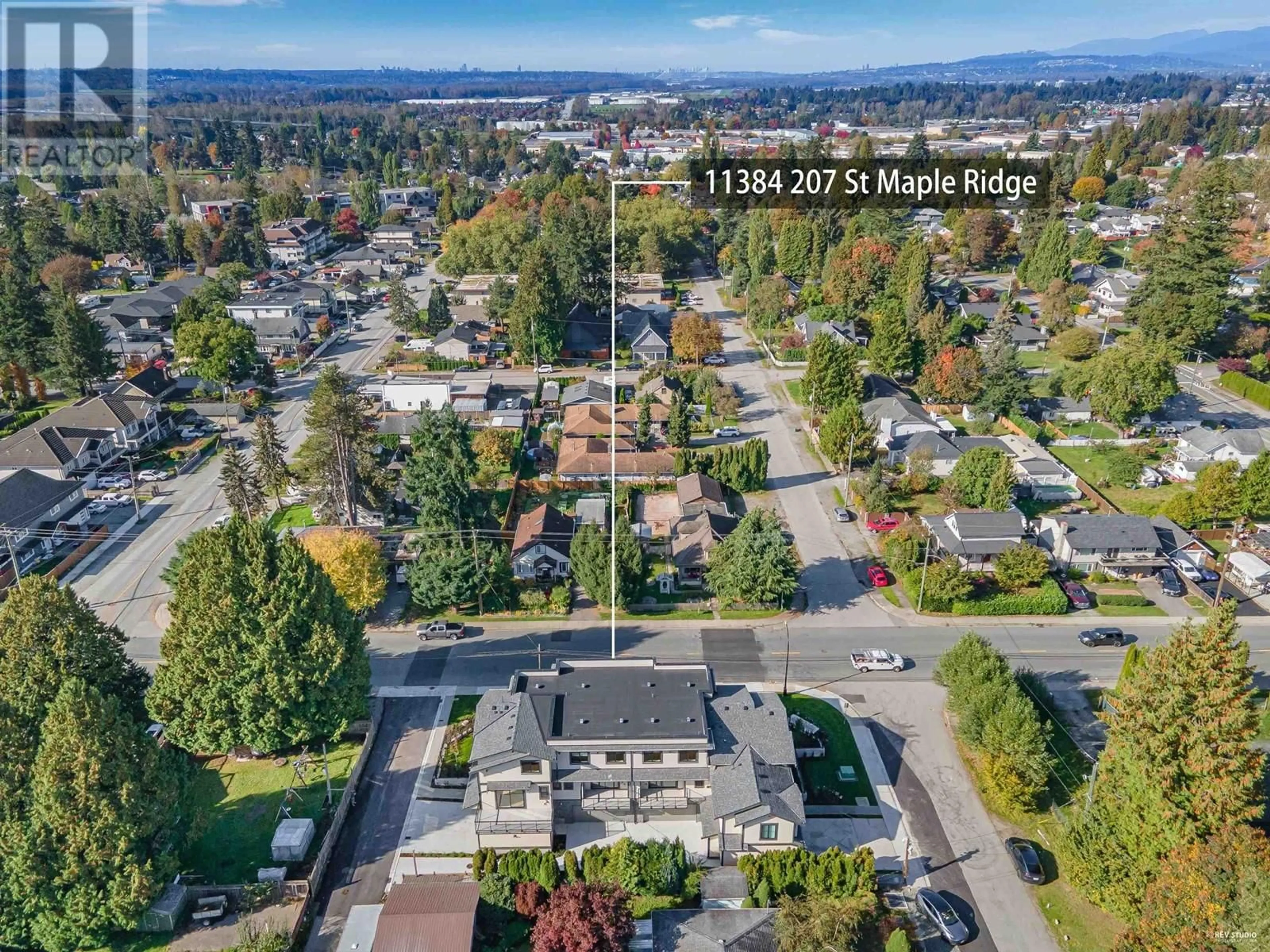 Frontside or backside of a home, the street view for 2 11384 207TH STREET, Maple Ridge British Columbia V2X1W6