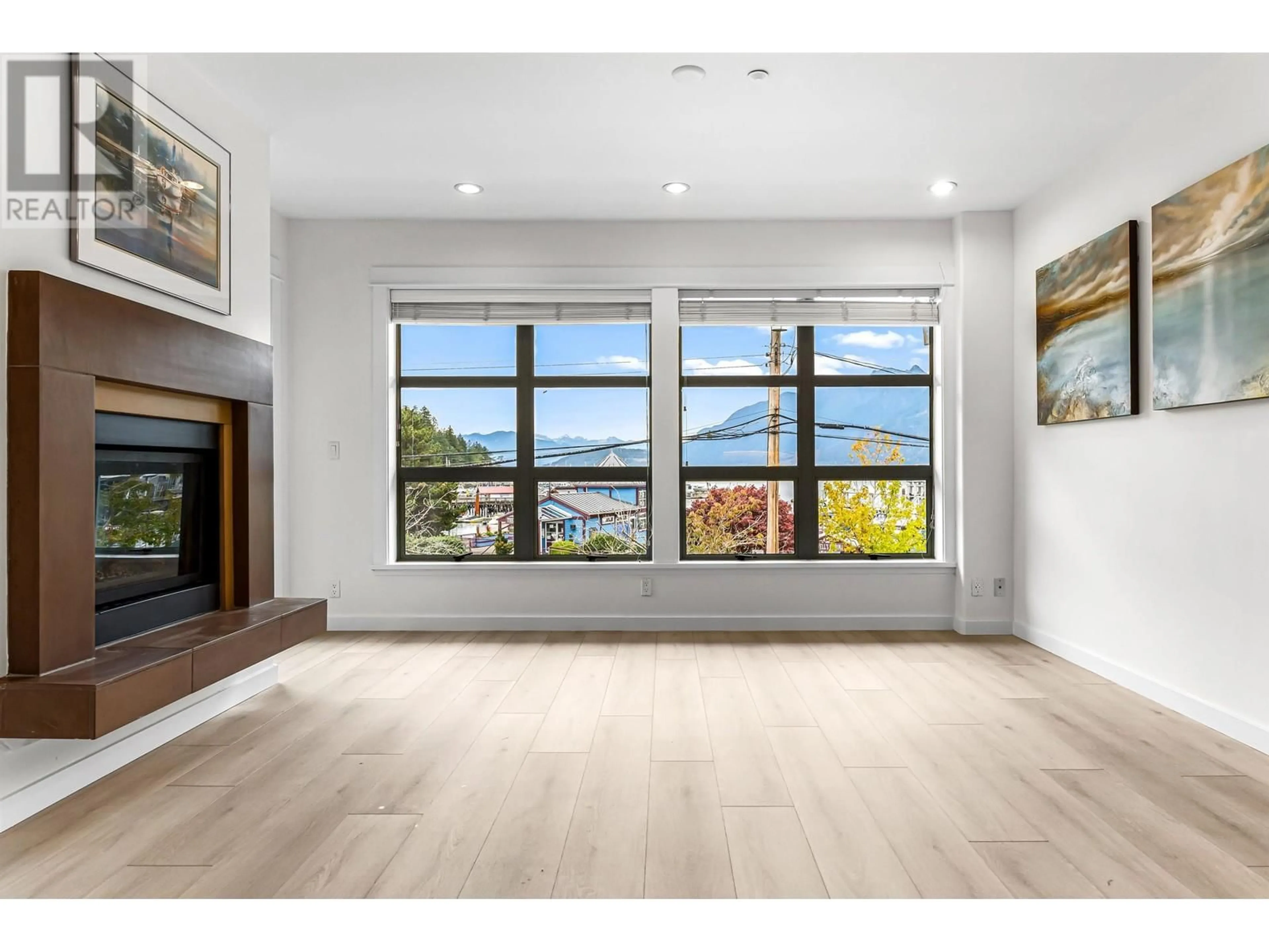 A pic of a room, wood floors for 201 6688 ROYAL AVENUE, West Vancouver British Columbia V7W2B9