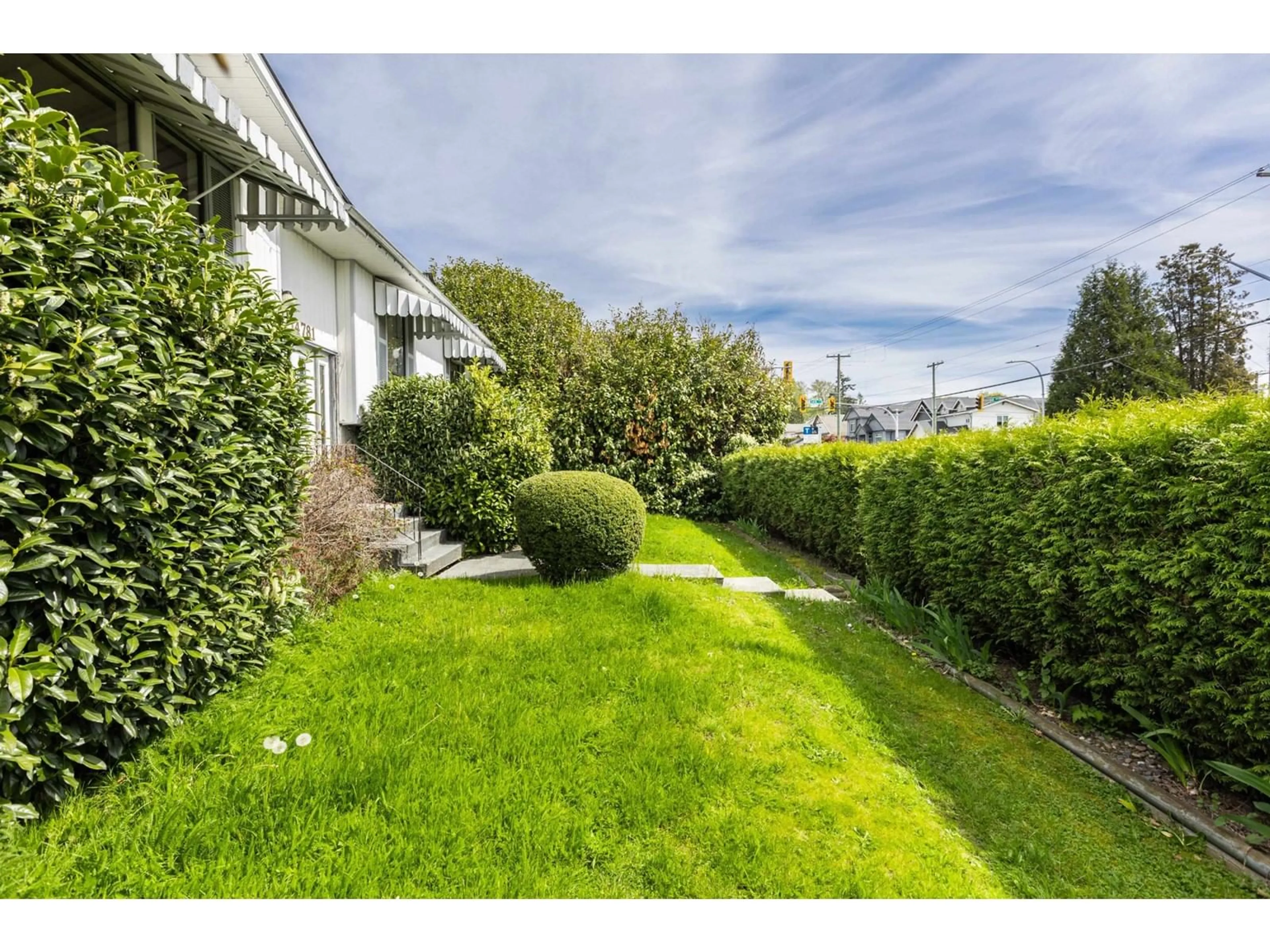 A pic from exterior of the house or condo, the fenced backyard for 14781 88 AVENUE, Surrey British Columbia V3S2S2