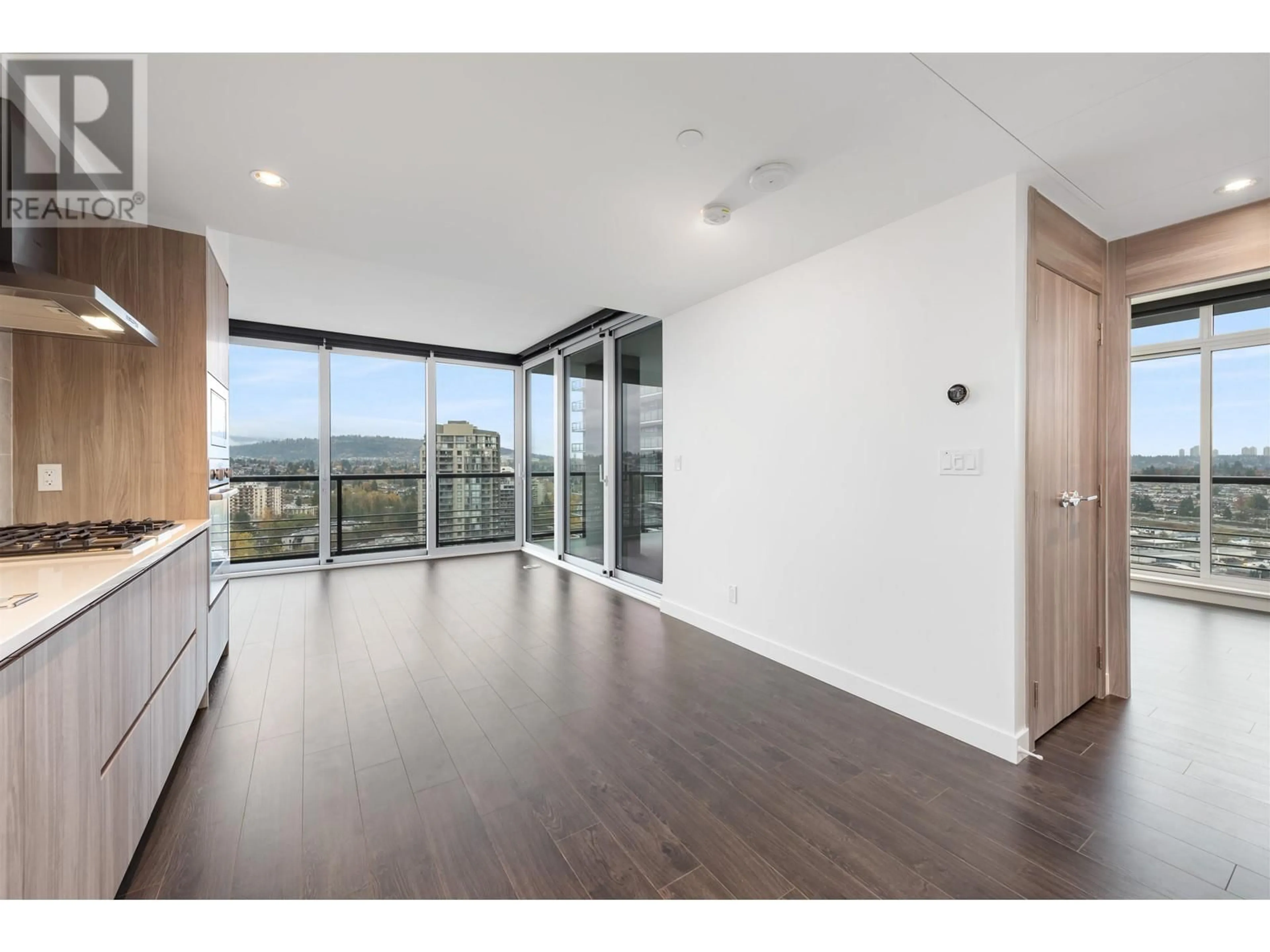 A pic of a room, wood floors for 2409 4720 LOUGHEED HIGHWAY, Burnaby British Columbia V5C0M8