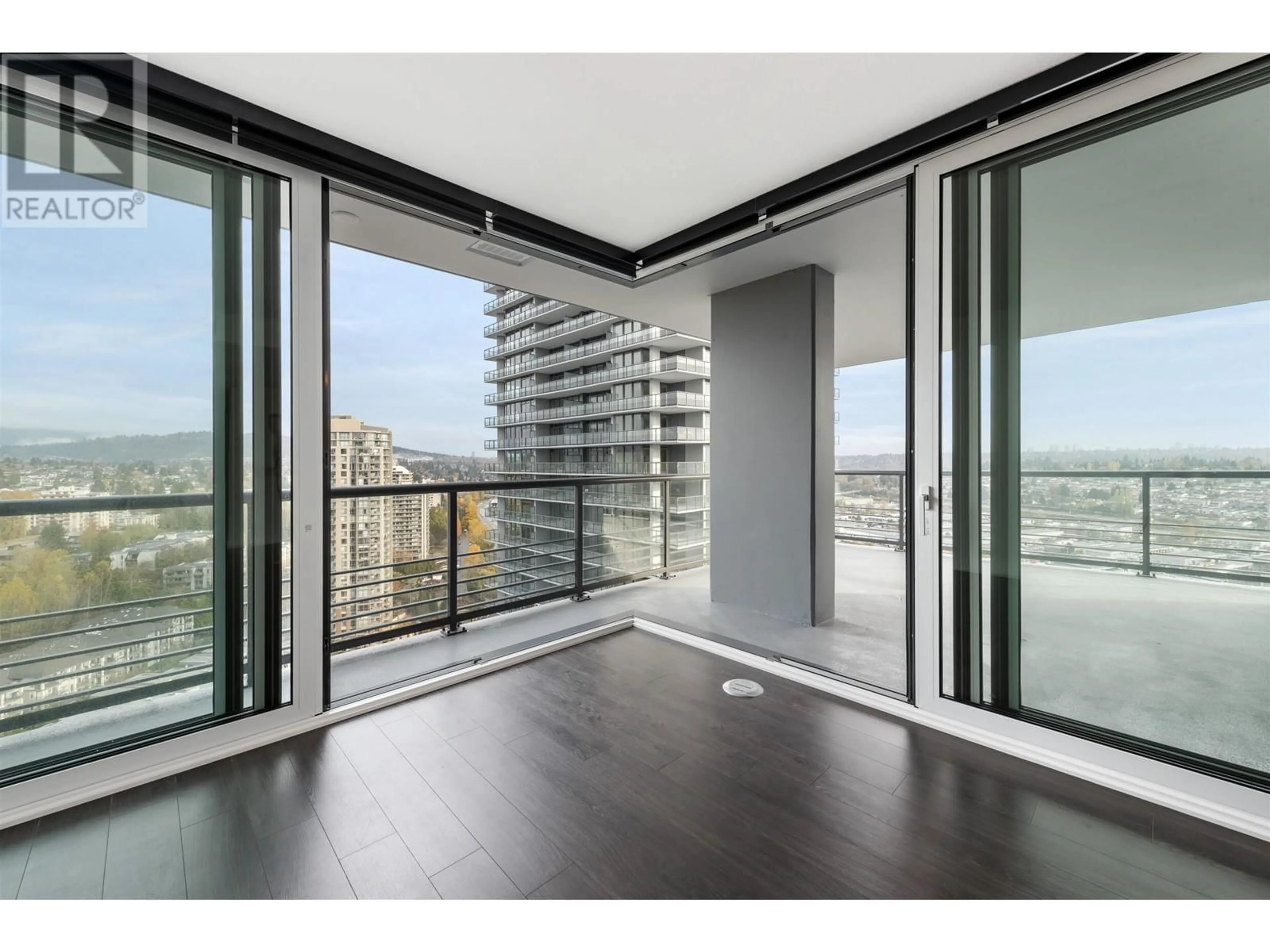 A pic of a room, wood floors for 2409 4720 LOUGHEED HIGHWAY, Burnaby British Columbia V5C0M8