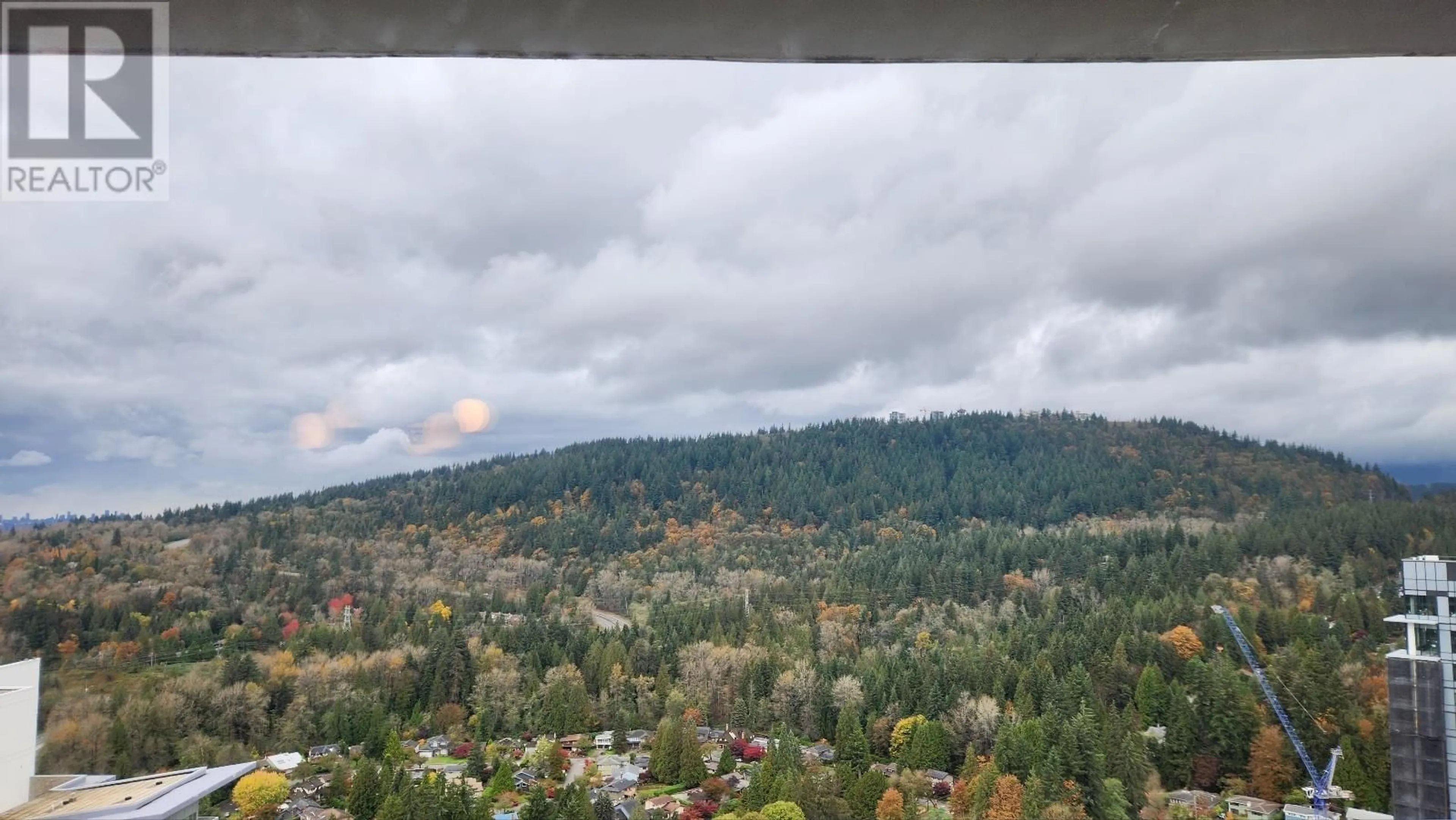 A pic from exterior of the house or condo, the view of mountain for 2703 567 CLARKE ROAD, Coquitlam British Columbia V3J0K7