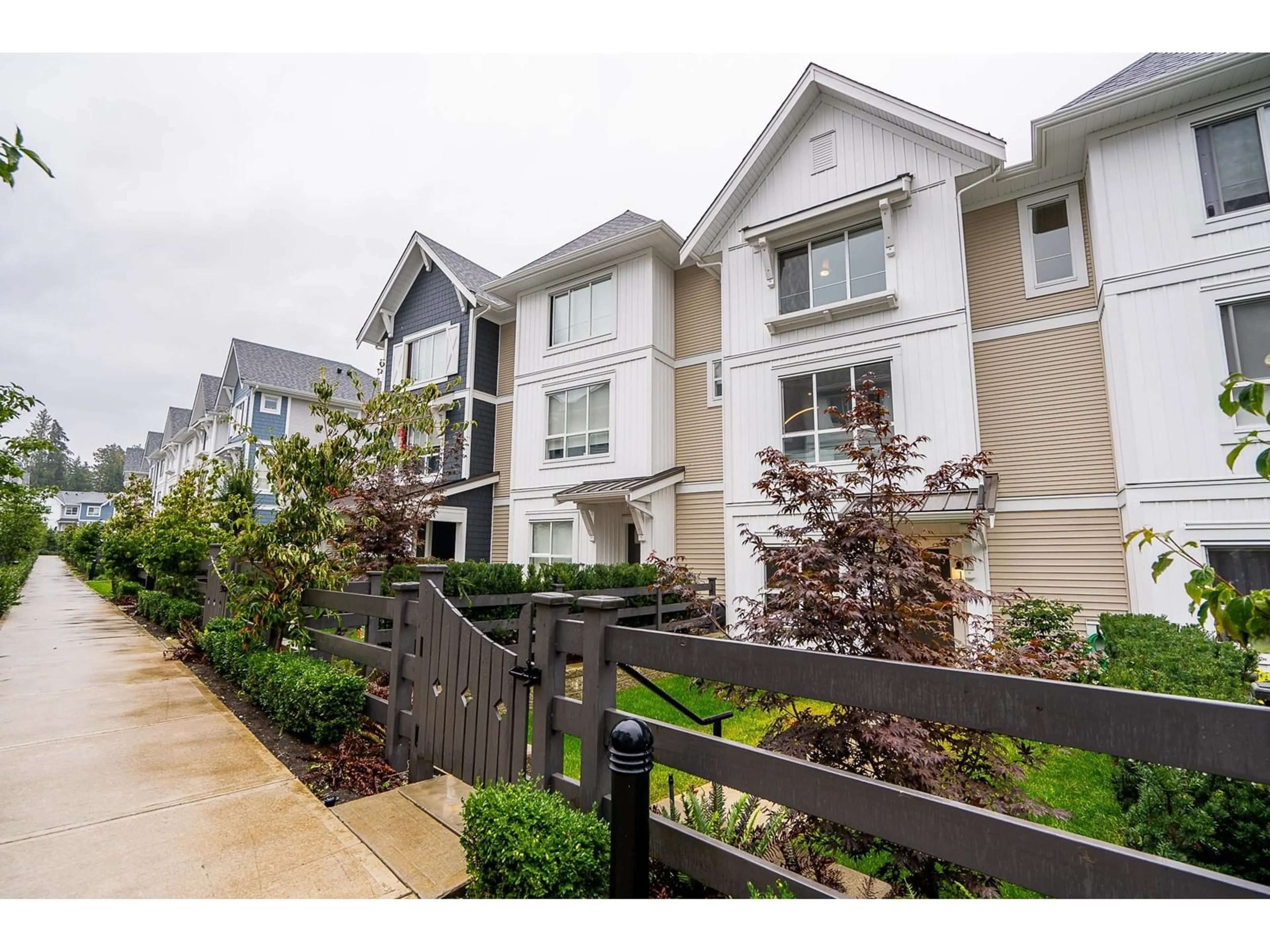 A pic from exterior of the house or condo, the fenced backyard for 119 8335 NELSON STREET, Mission British Columbia V4S0E4