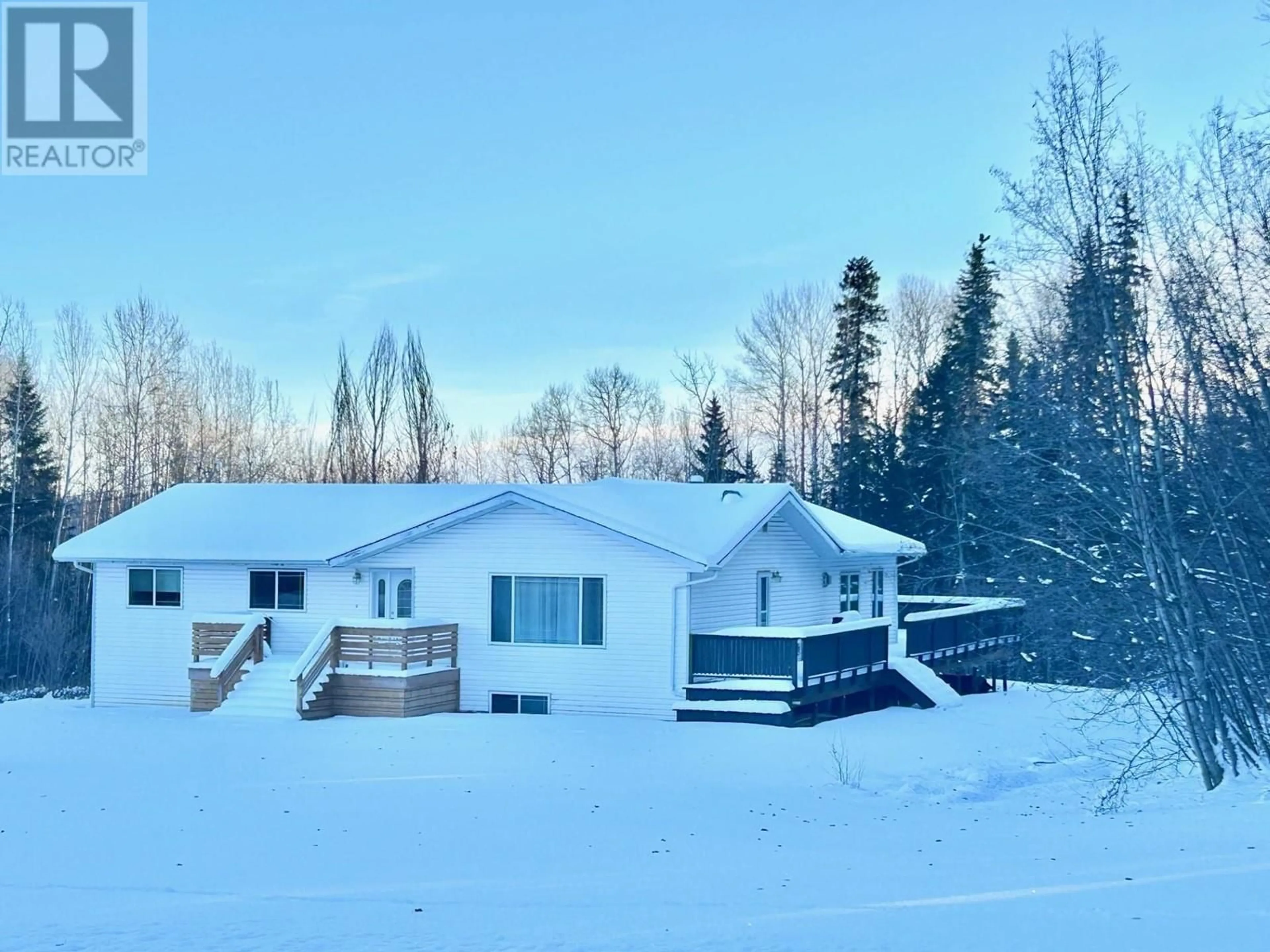 A pic from outside/outdoor area/front of a property/back of a property/a pic from drone, mountain view for 27 RAVEN CRESCENT, Fort Nelson British Columbia V0C1R0