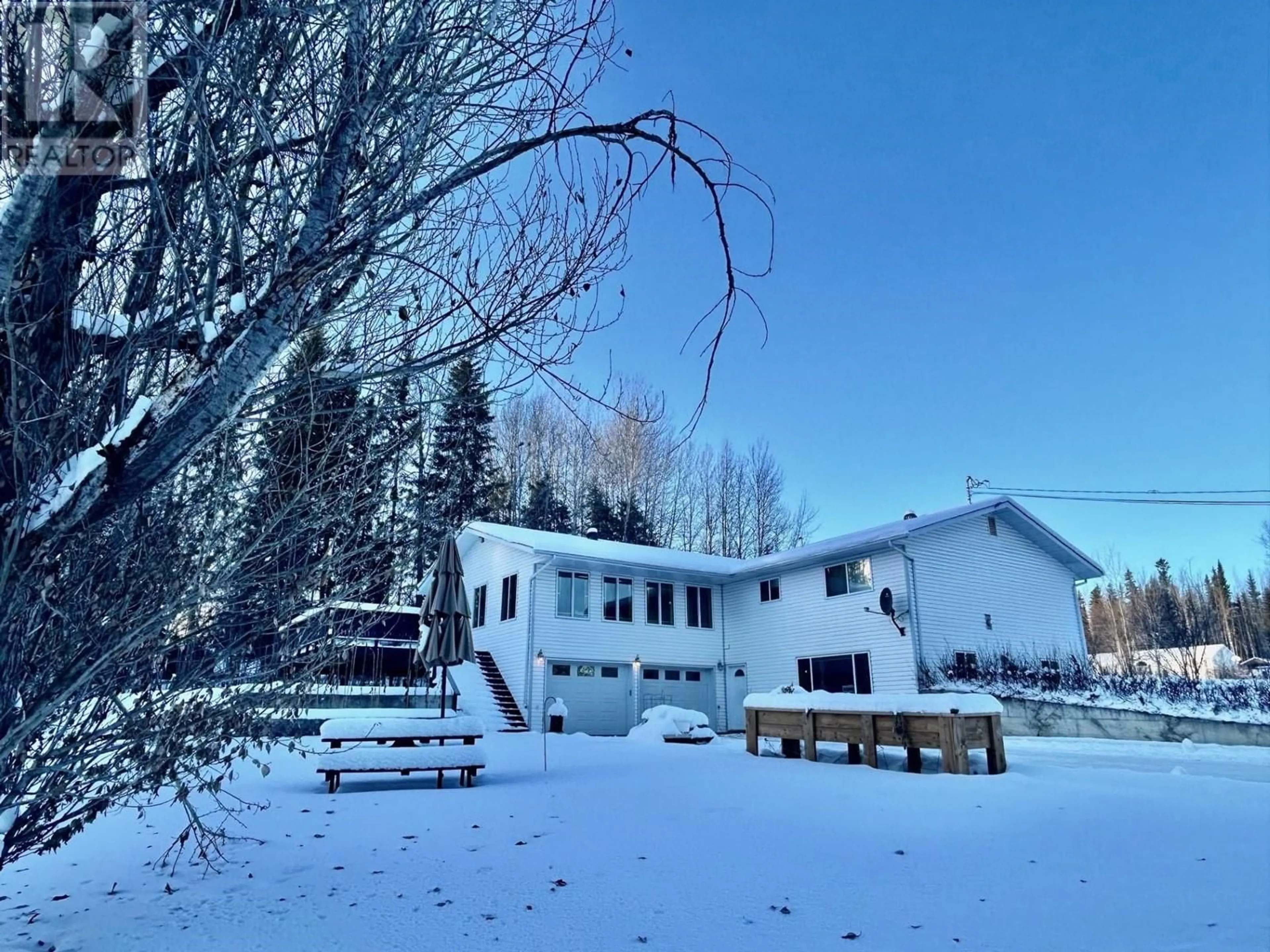 A pic from outside/outdoor area/front of a property/back of a property/a pic from drone, unknown for 27 RAVEN CRESCENT, Fort Nelson British Columbia V0C1R0