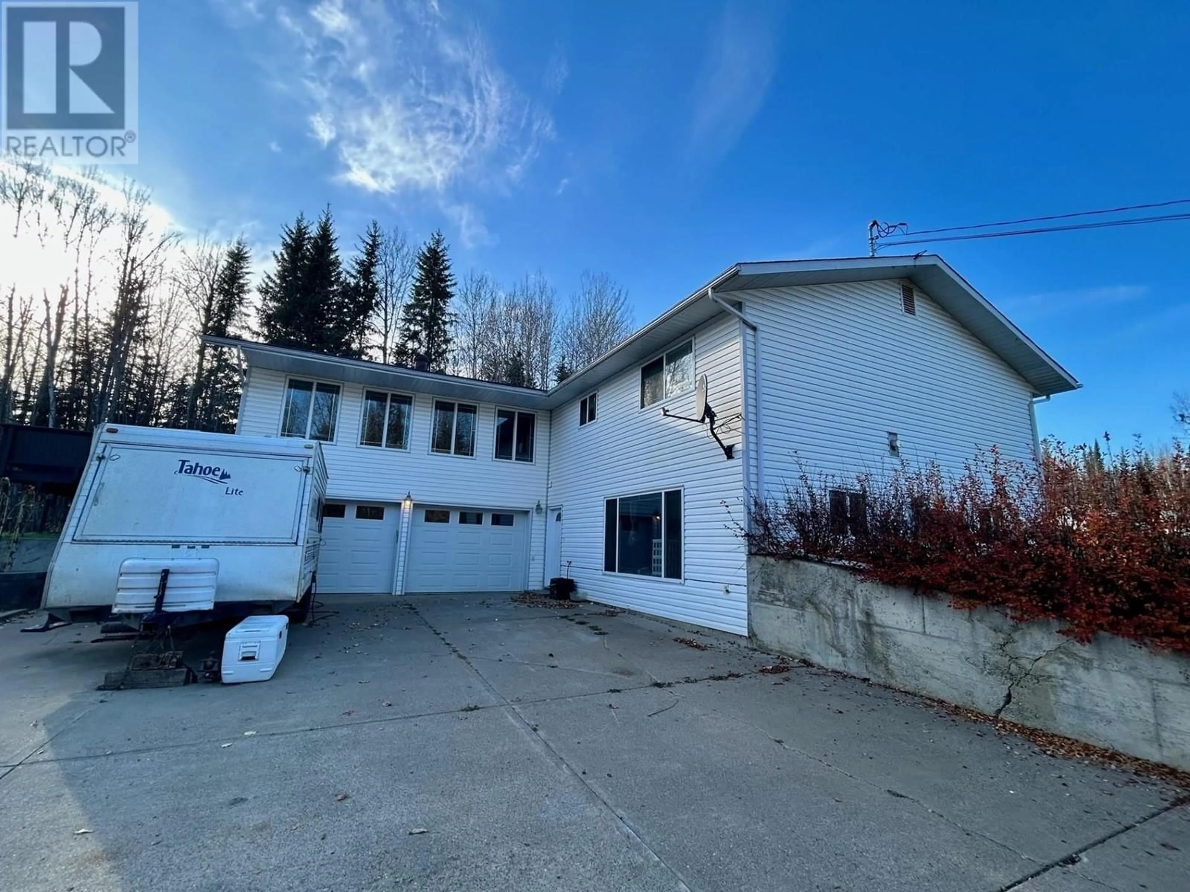 A pic from outside/outdoor area/front of a property/back of a property/a pic from drone, building for 27 RAVEN CRESCENT, Fort Nelson British Columbia V0C1R0