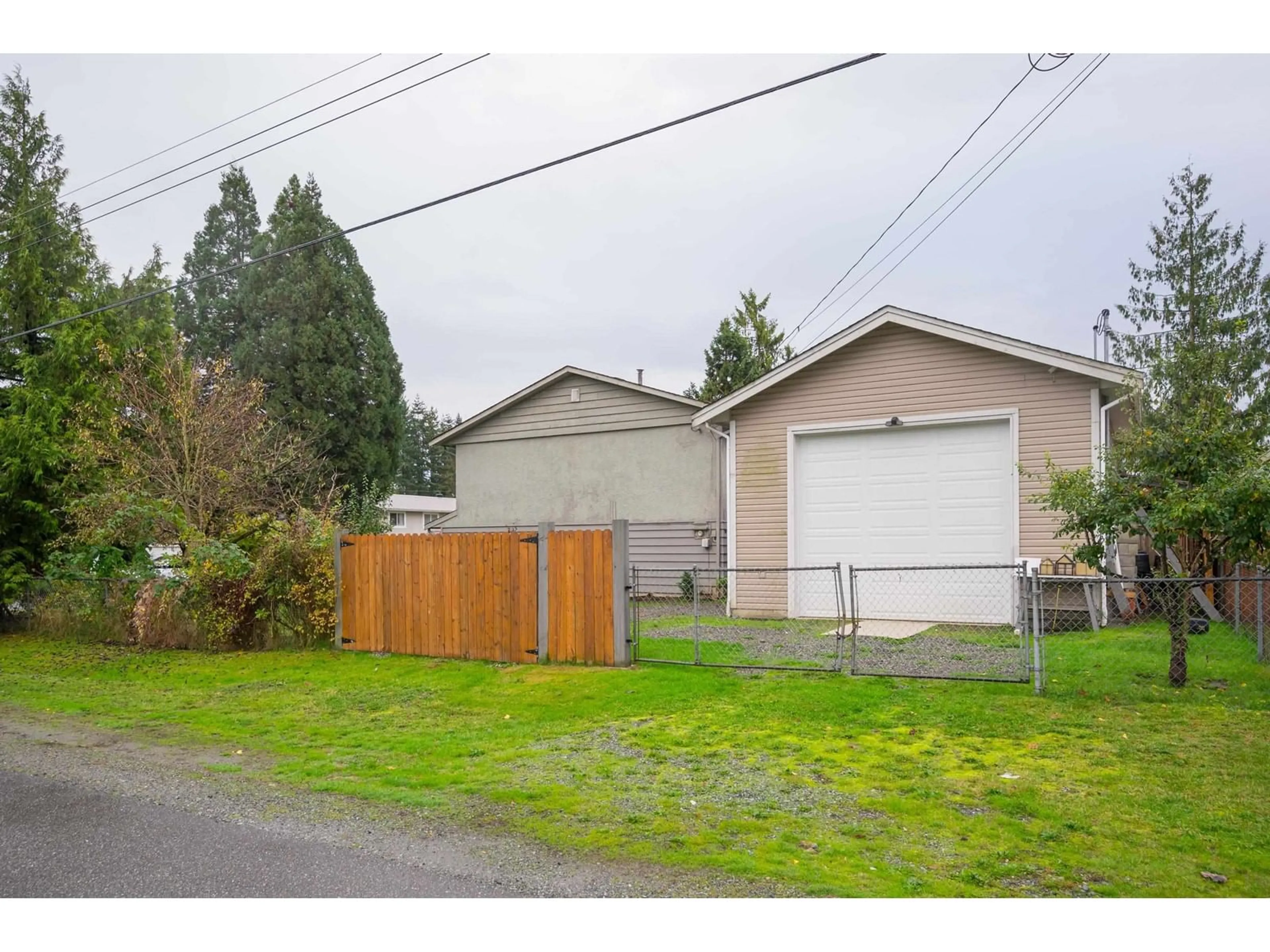 Frontside or backside of a home, the fenced backyard for 2877 270B STREET, Langley British Columbia V4W3A5