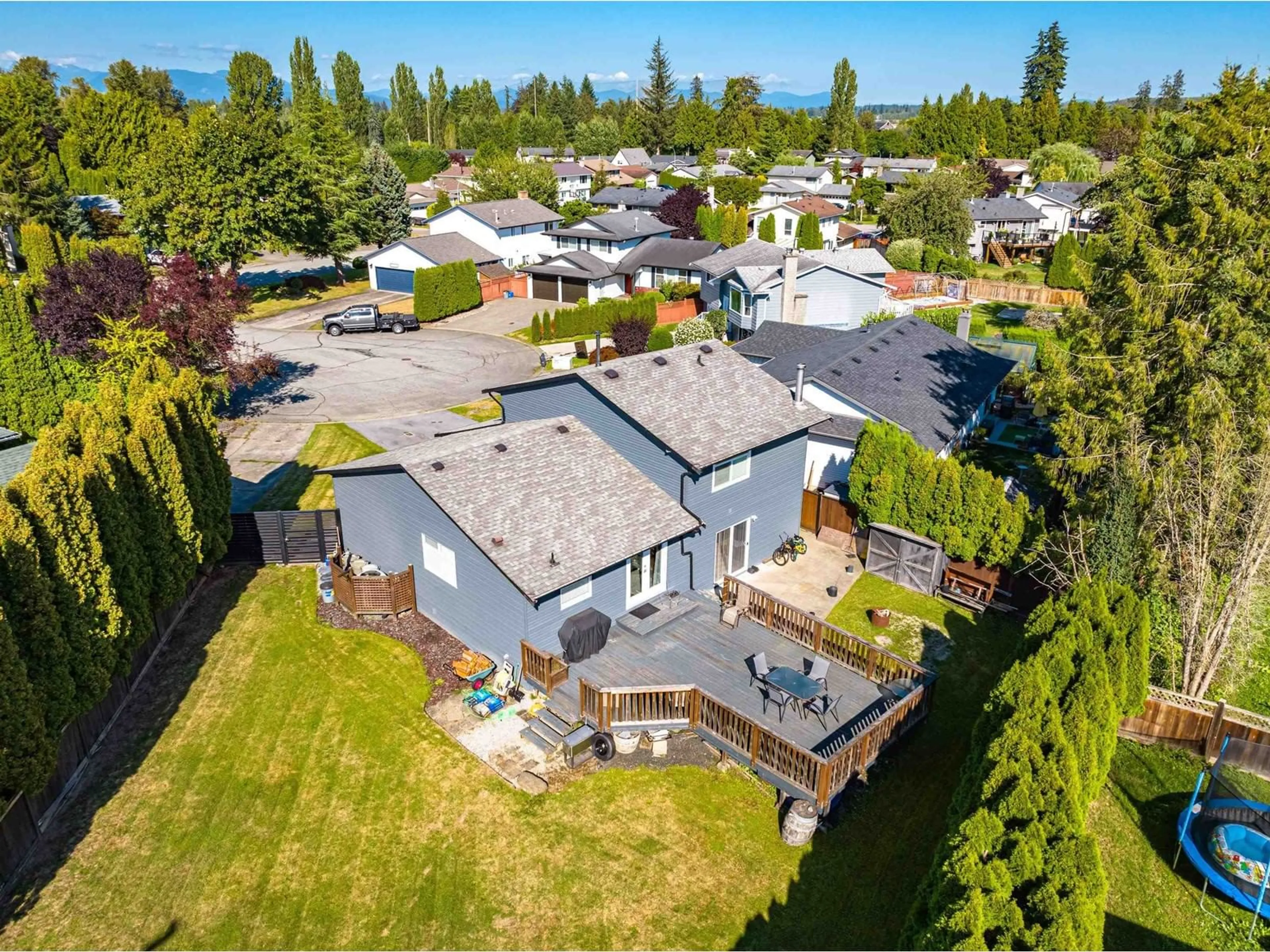 Frontside or backside of a home, the fenced backyard for 5125 208A STREET, Langley British Columbia V3A7L9