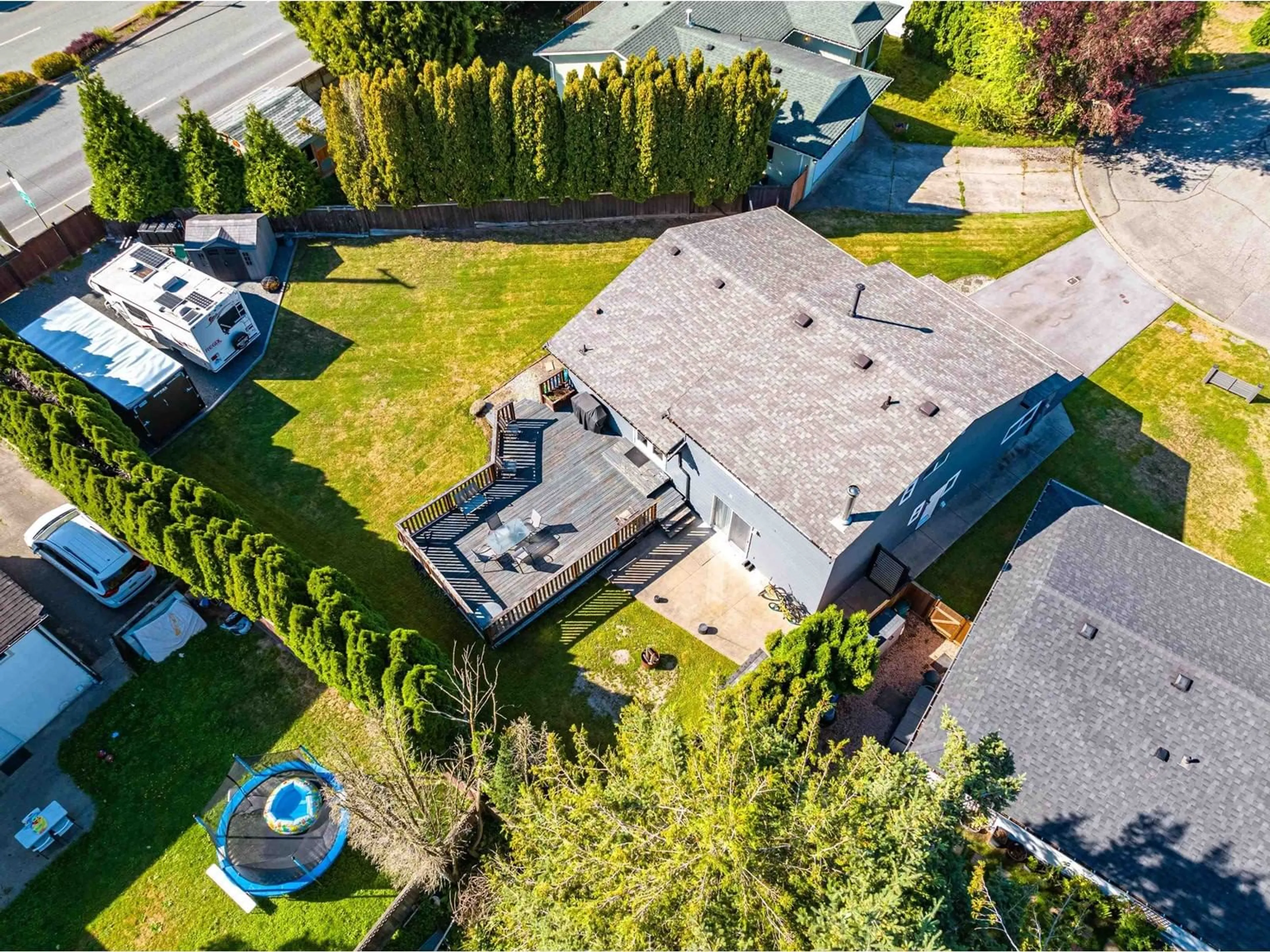 Frontside or backside of a home, the fenced backyard for 5125 208A STREET, Langley British Columbia V3A7L9