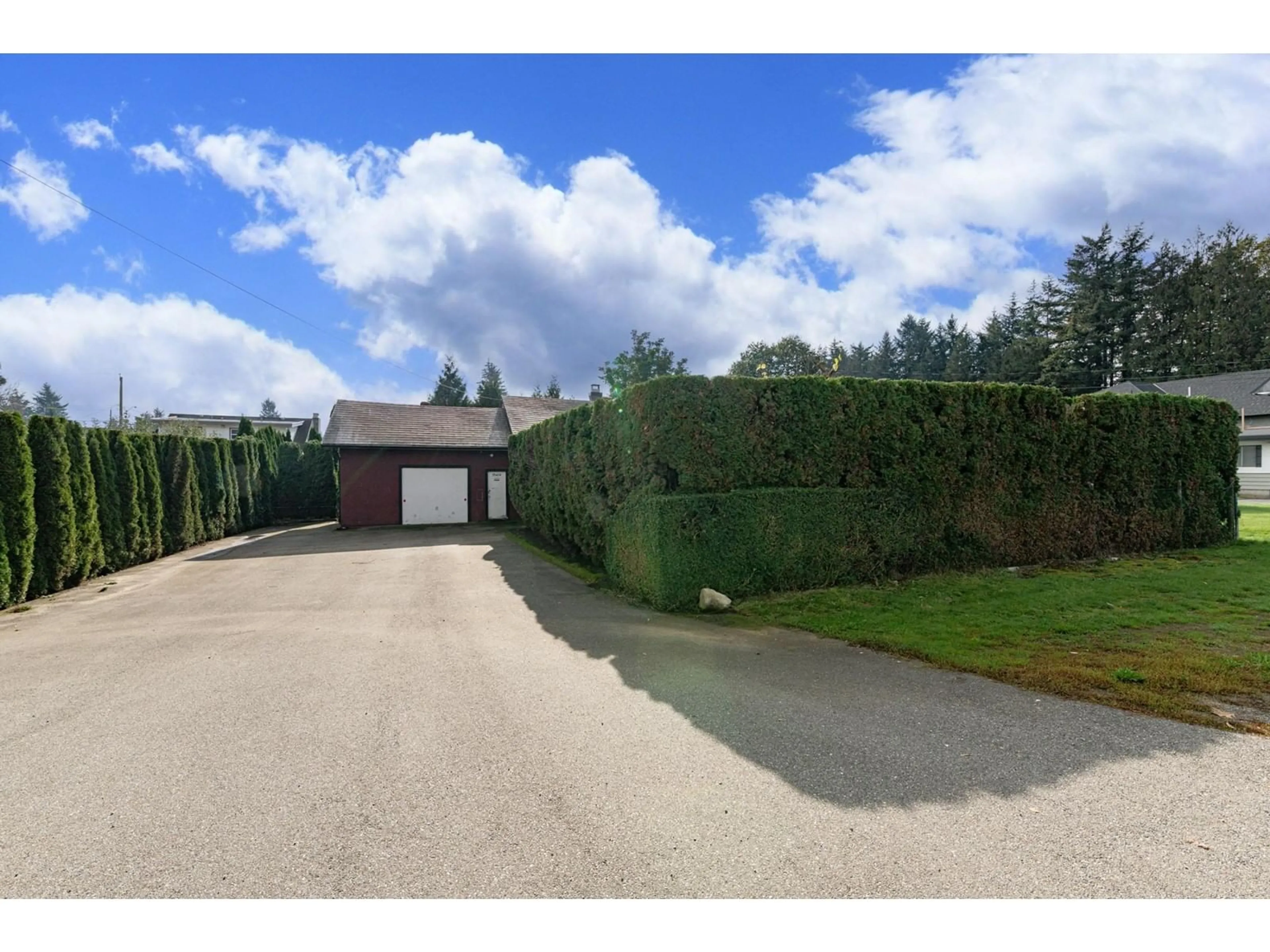 Frontside or backside of a home, the fenced backyard for 33474 HAWTHORNE AVENUE, Abbotsford British Columbia V2S1B8