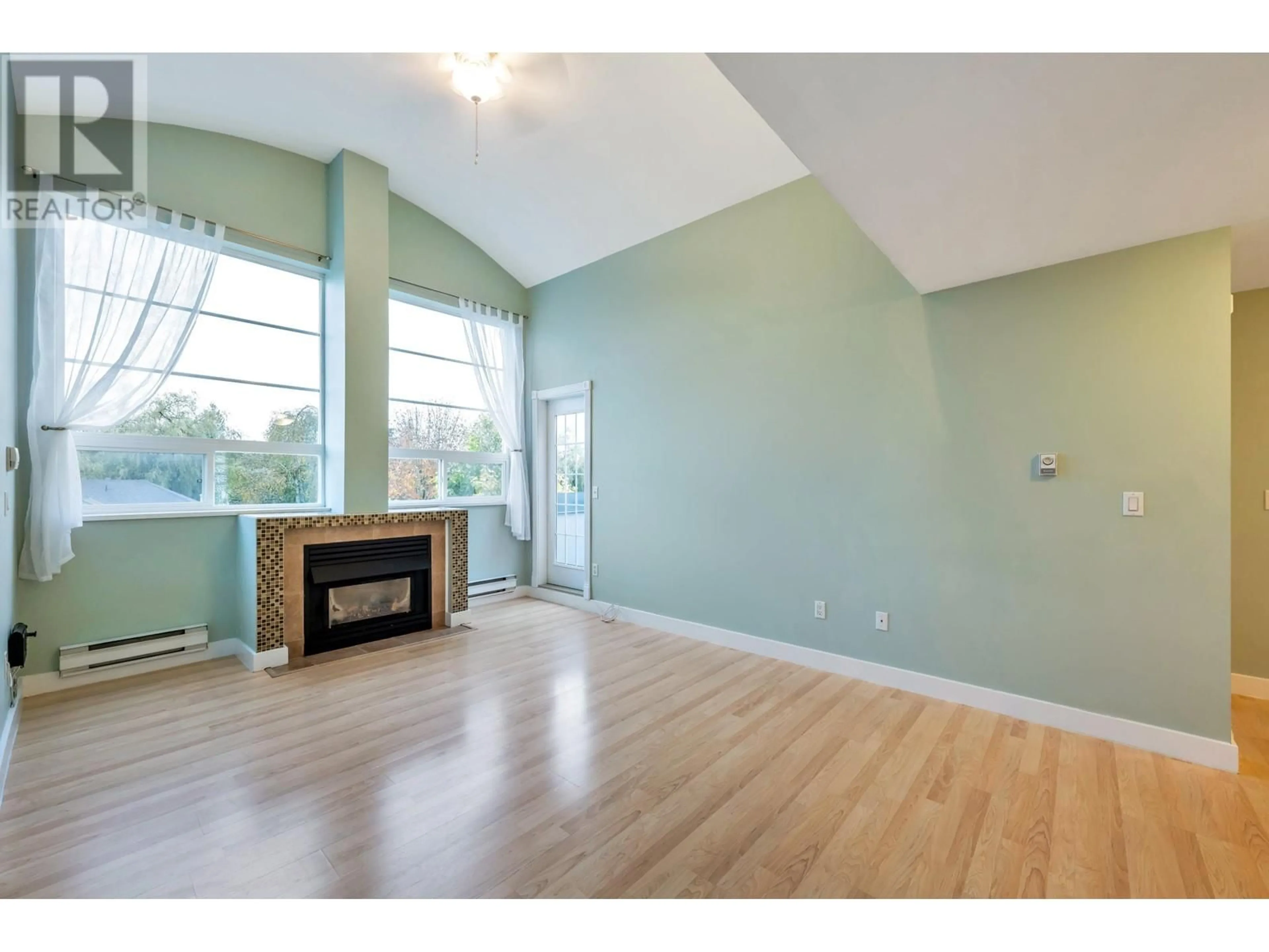 A pic of a room, wood floors for 403 11519 BURNETT STREET, Maple Ridge British Columbia V2X6P3