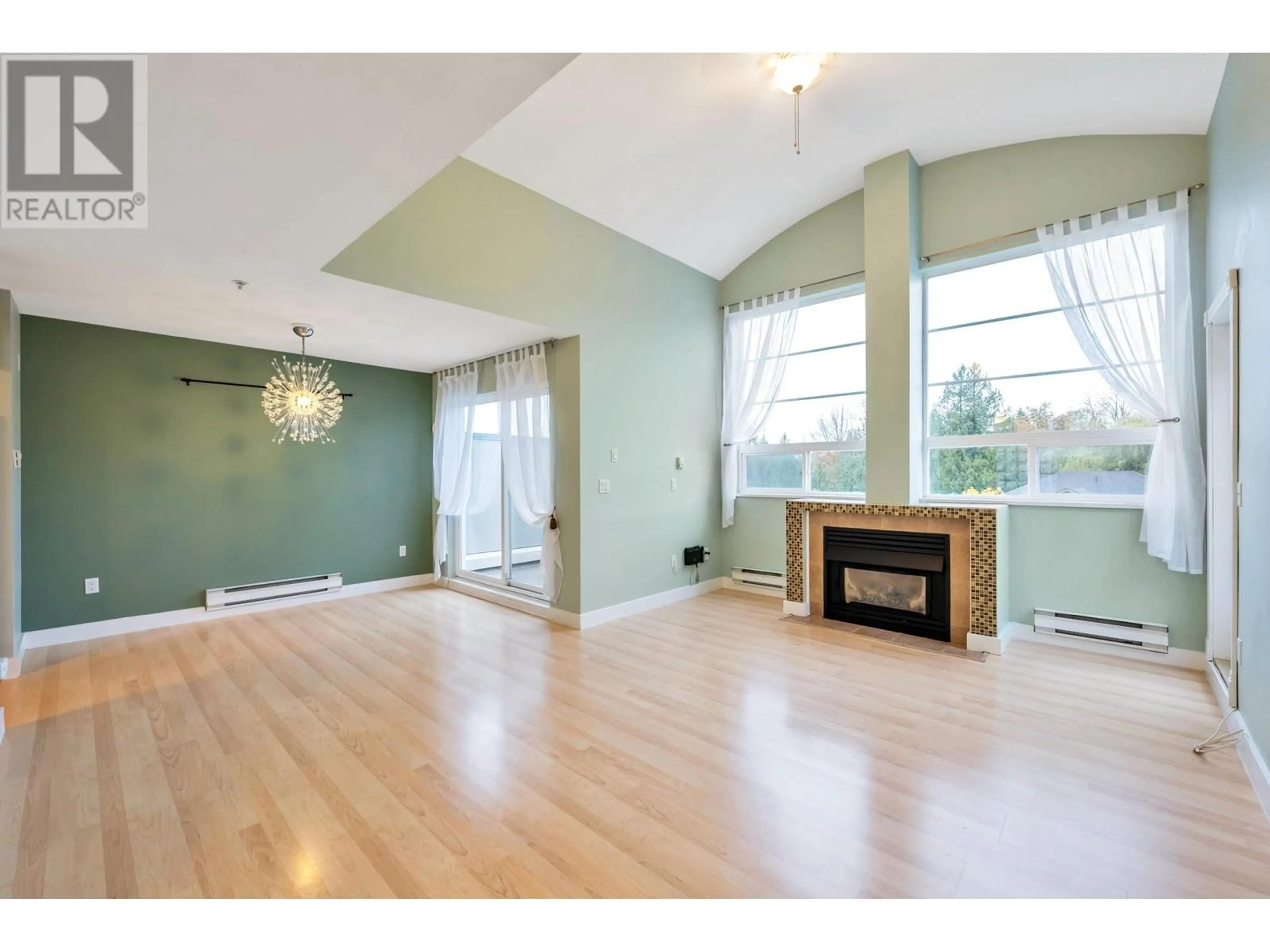 A pic of a room, wood floors for 403 11519 BURNETT STREET, Maple Ridge British Columbia V2X6P3