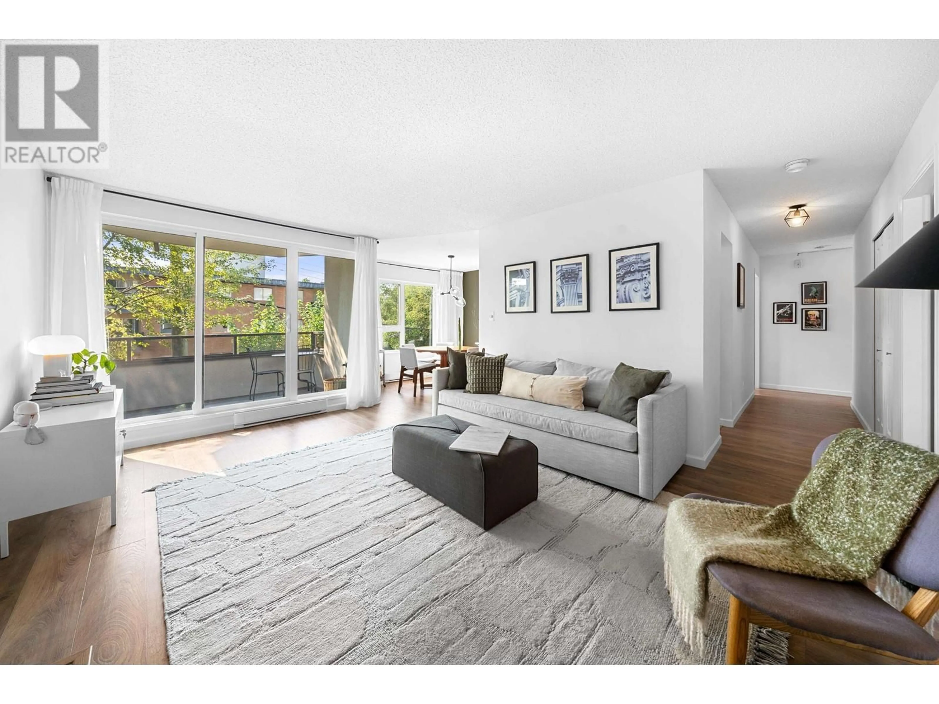 Living room, wood floors for 207 145 E 12TH STREET, North Vancouver British Columbia V7L2J3