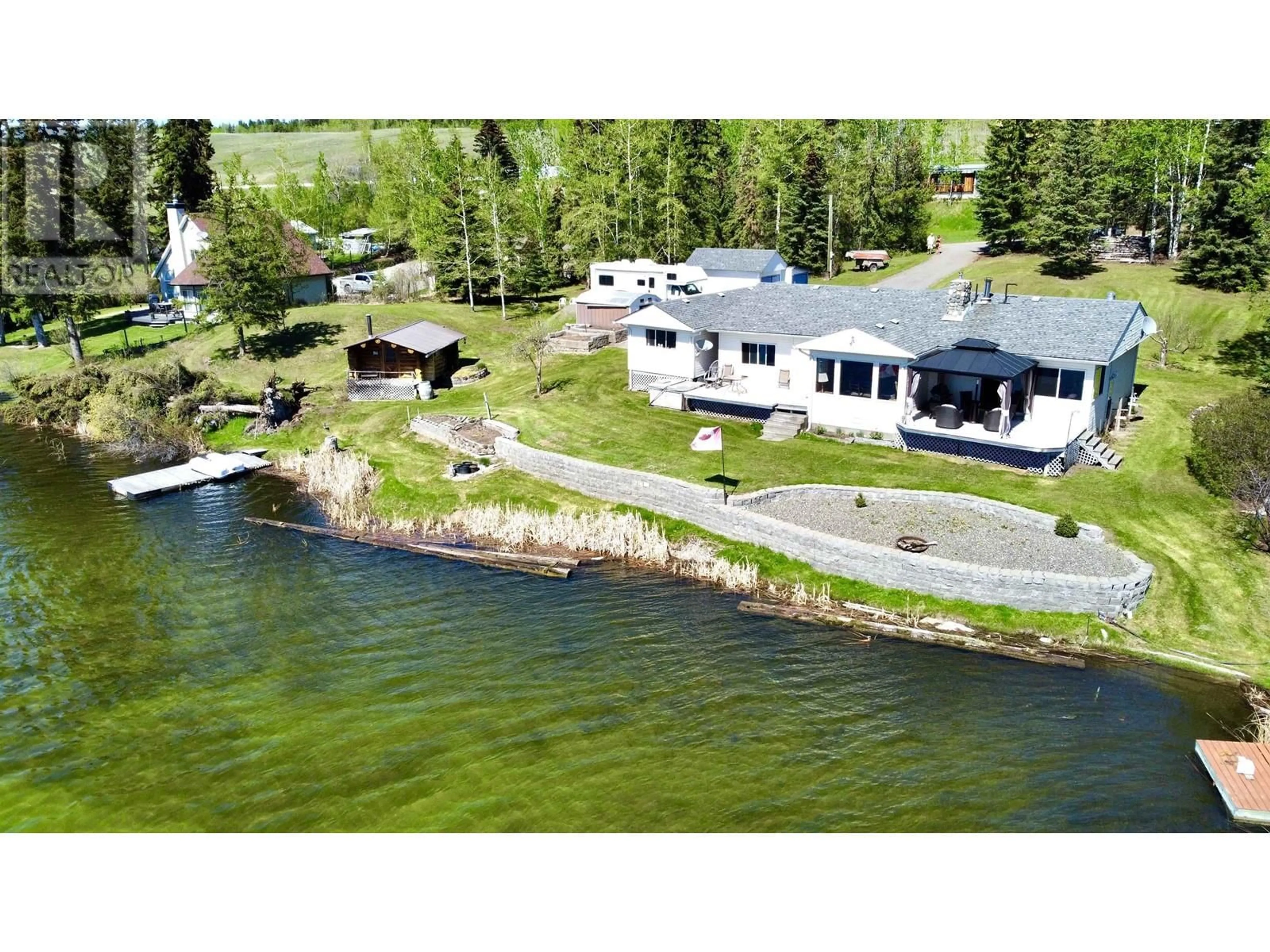A pic from outside/outdoor area/front of a property/back of a property/a pic from drone, water/lake/river/ocean view for 3456 DUNSMUIR ROAD, Lac La Hache British Columbia V0K1T0