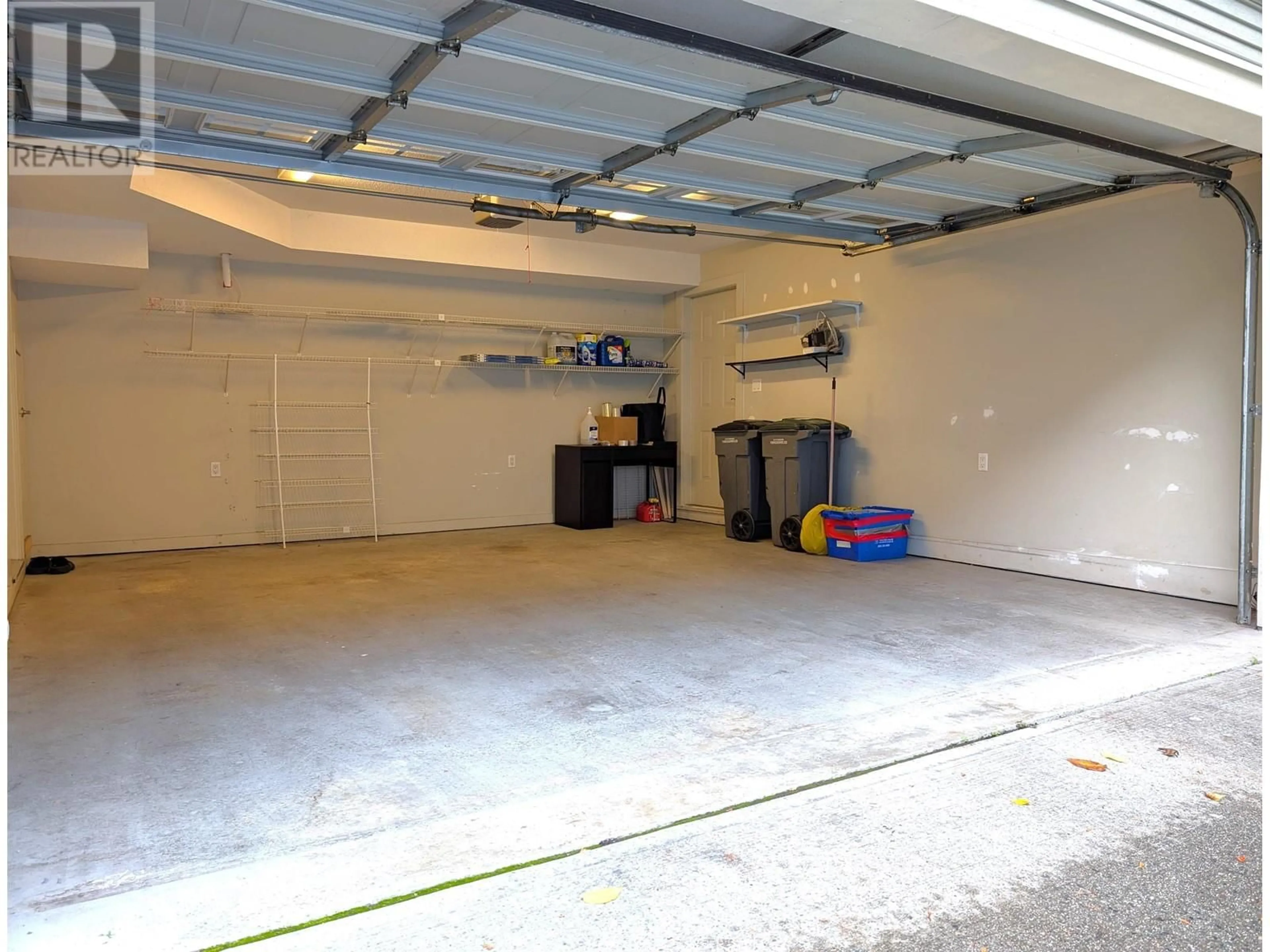 Indoor garage, cement floor for 3250 CLERMONT MEWS, Vancouver British Columbia V5S4X3