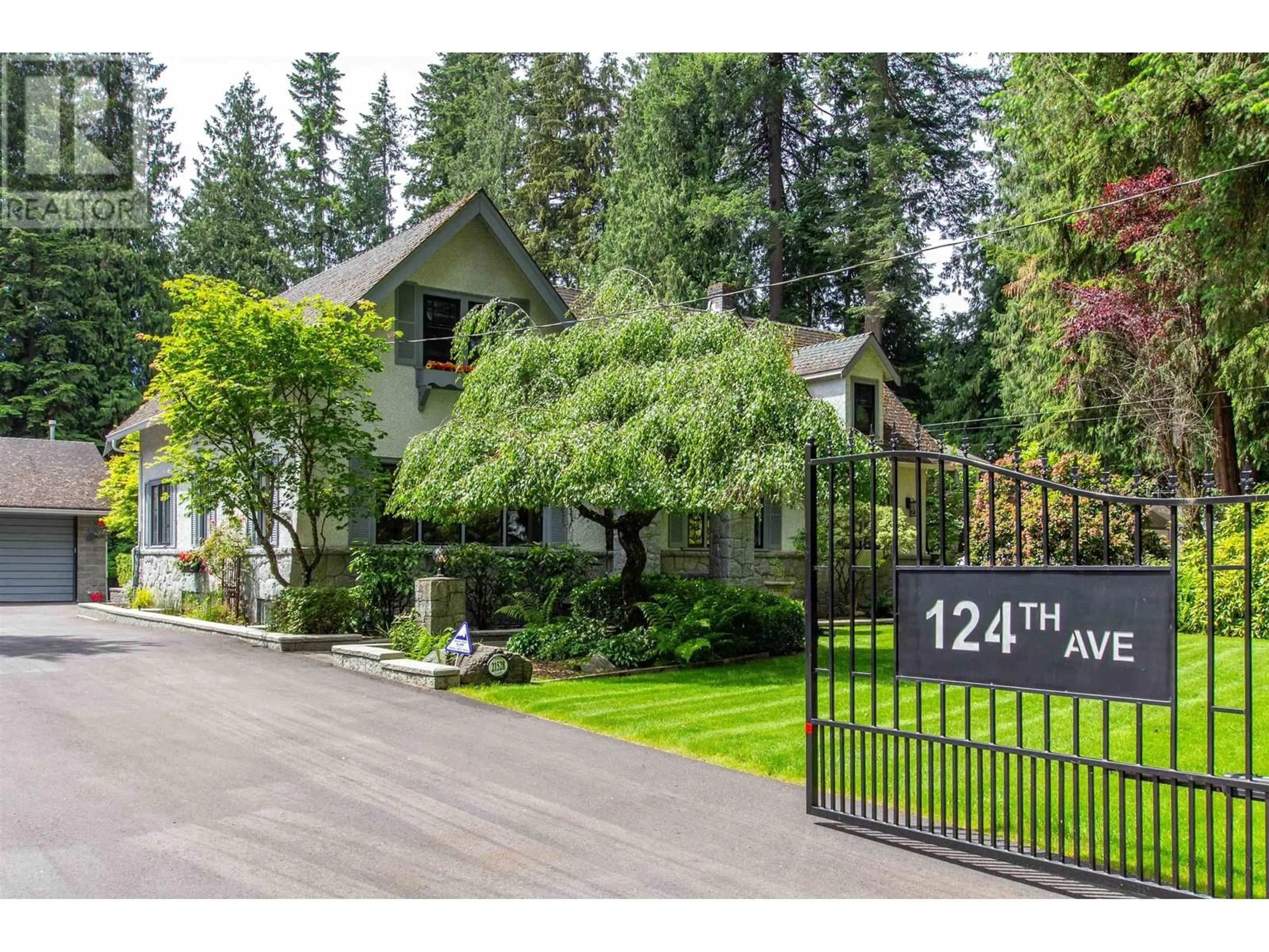 Frontside or backside of a home, the fenced backyard for 21528 124 AVENUE, Maple Ridge British Columbia V2X4H3