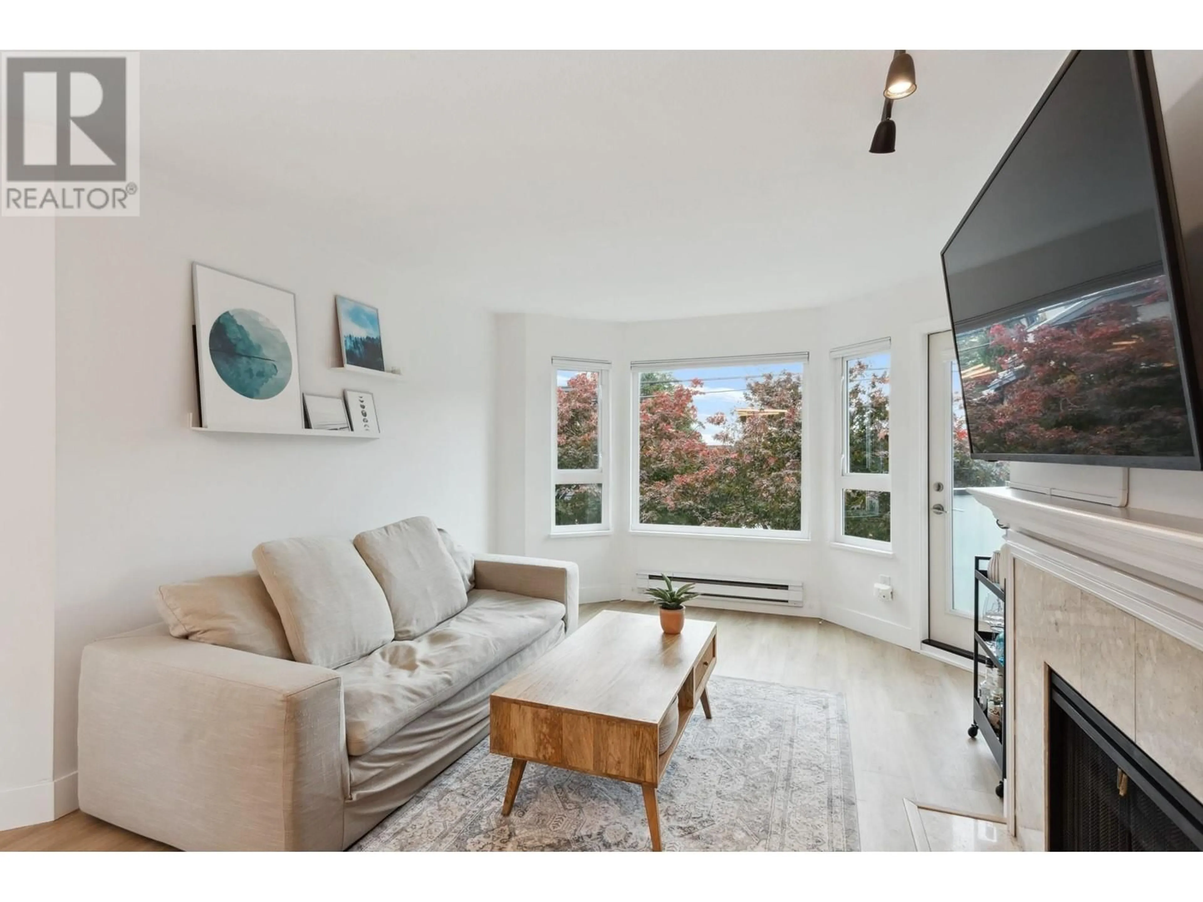 Living room, wood floors for 102 315 E 3RD STREET, North Vancouver British Columbia V7L1G1