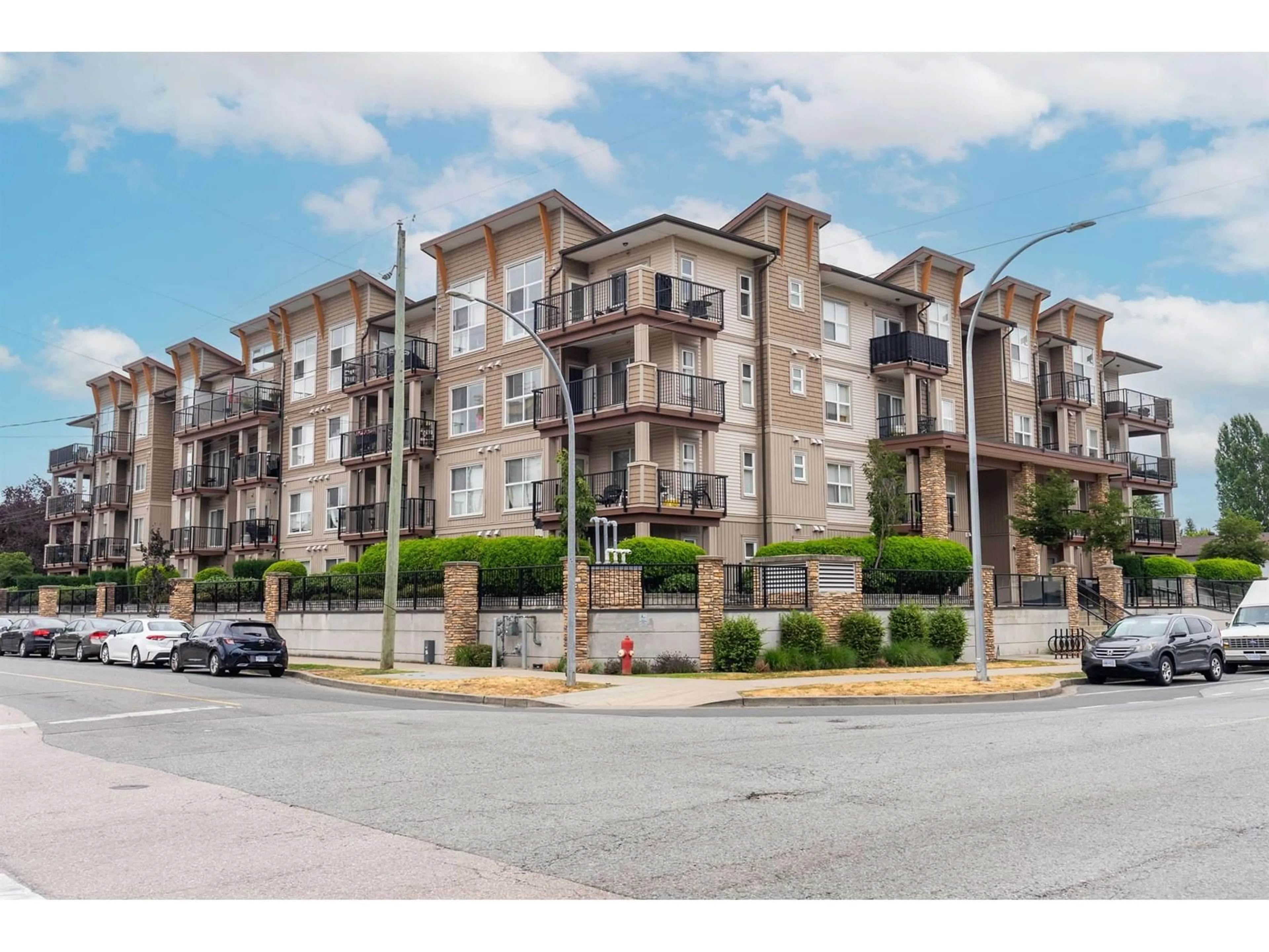 A pic from exterior of the house or condo, the street view for 109 20175 53 AVENUE, Langley British Columbia V3A0J8