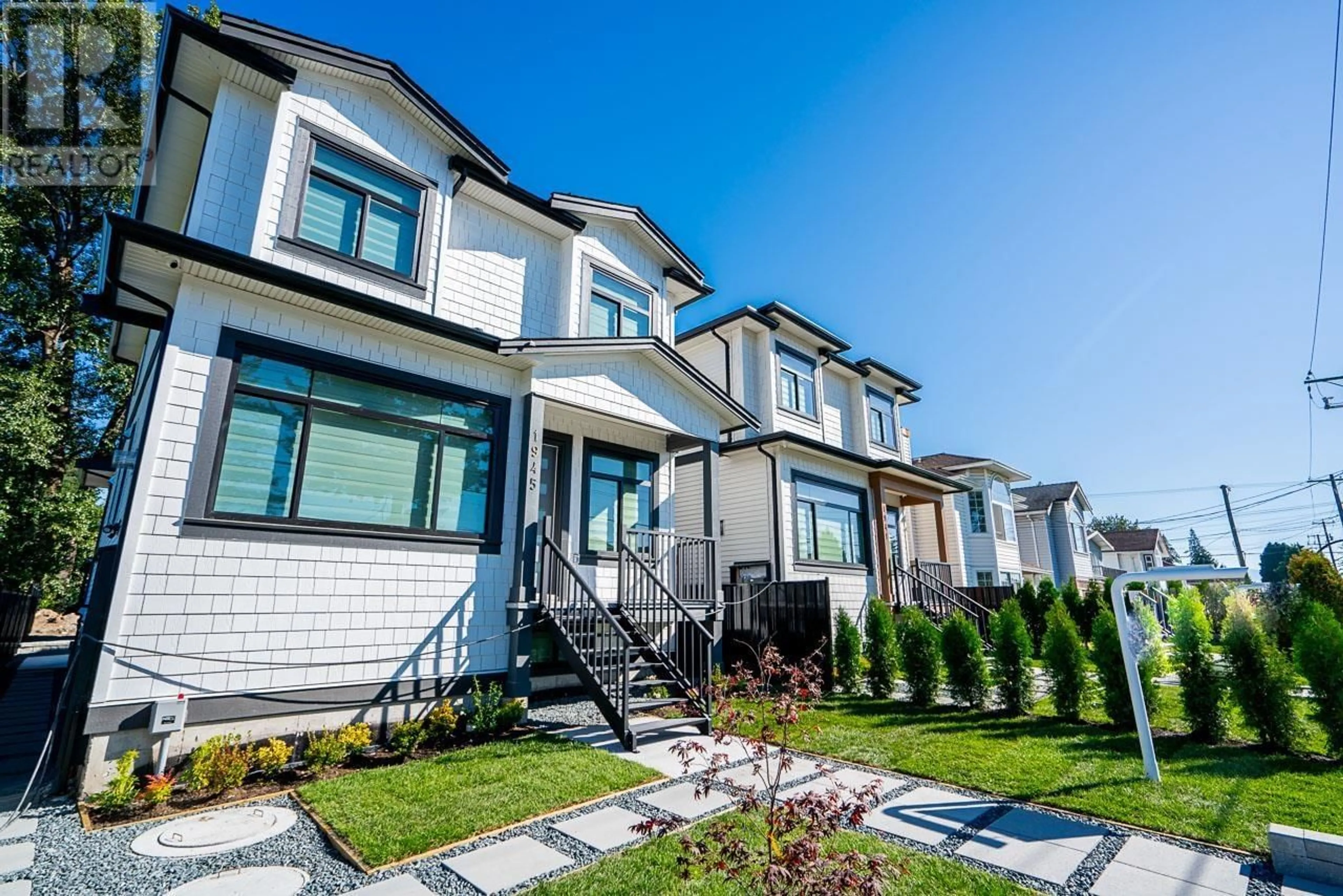 Frontside or backside of a home, the fenced backyard for 1945 PRAIRIE AVENUE, Port Coquitlam British Columbia V3B1V5