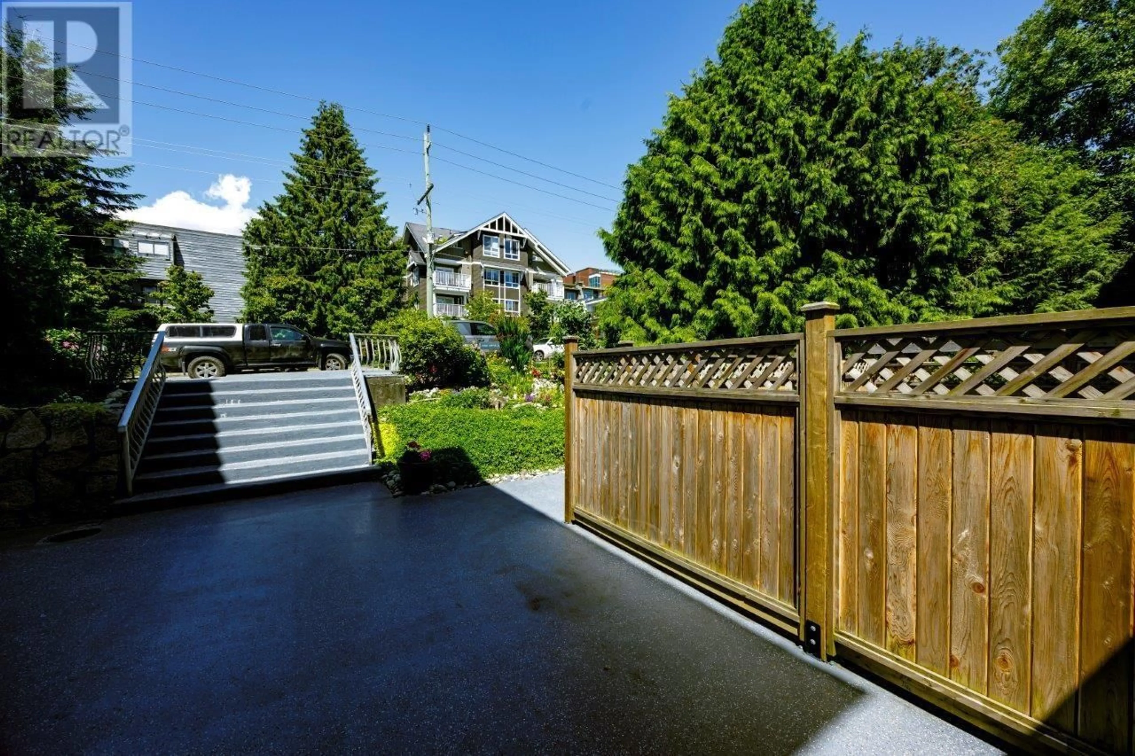 Patio, the fenced backyard for 112 135 W 21ST STREET, North Vancouver British Columbia V7M1Z2