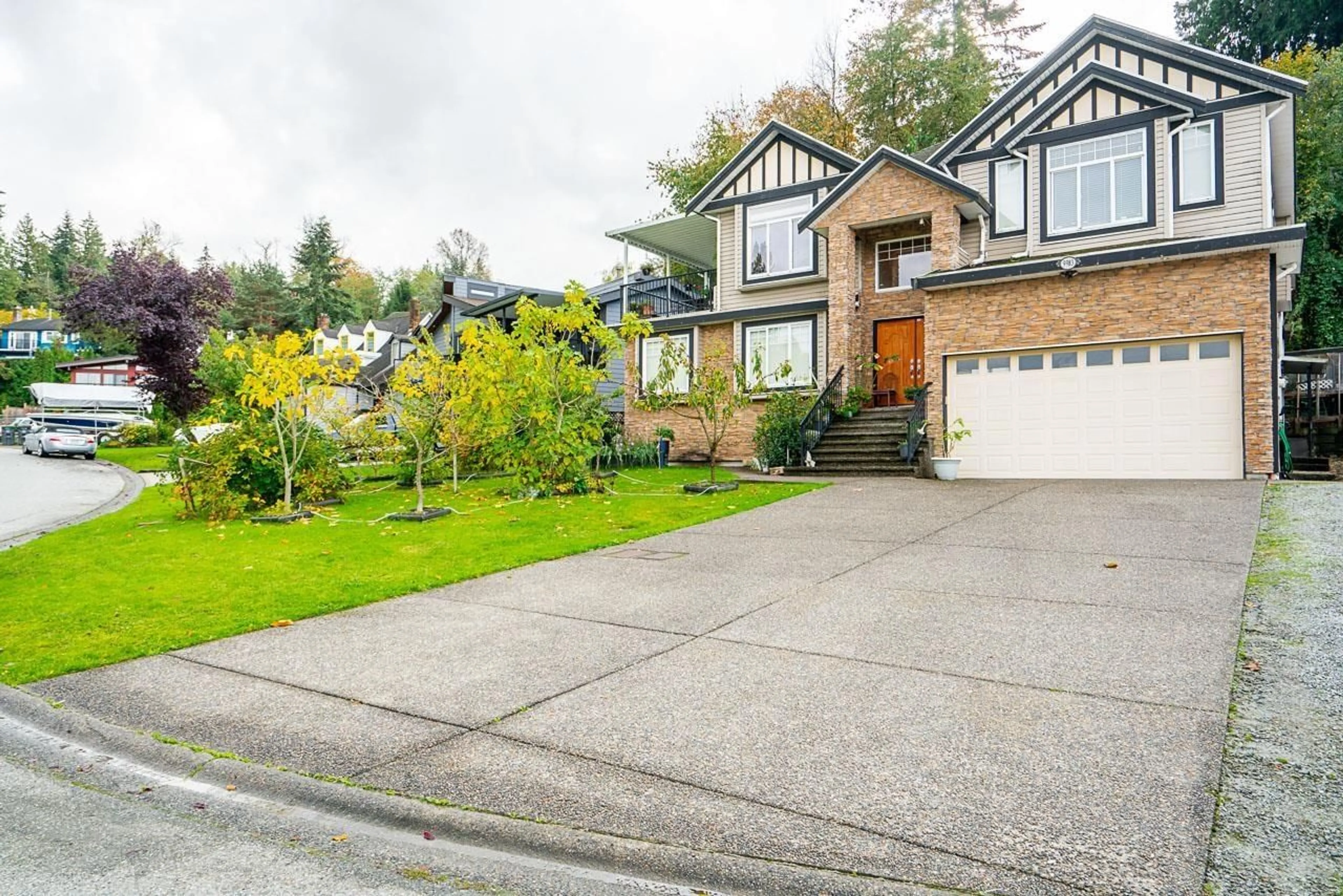 Frontside or backside of a home, the street view for 9983 117 STREET, Surrey British Columbia V3V7H5