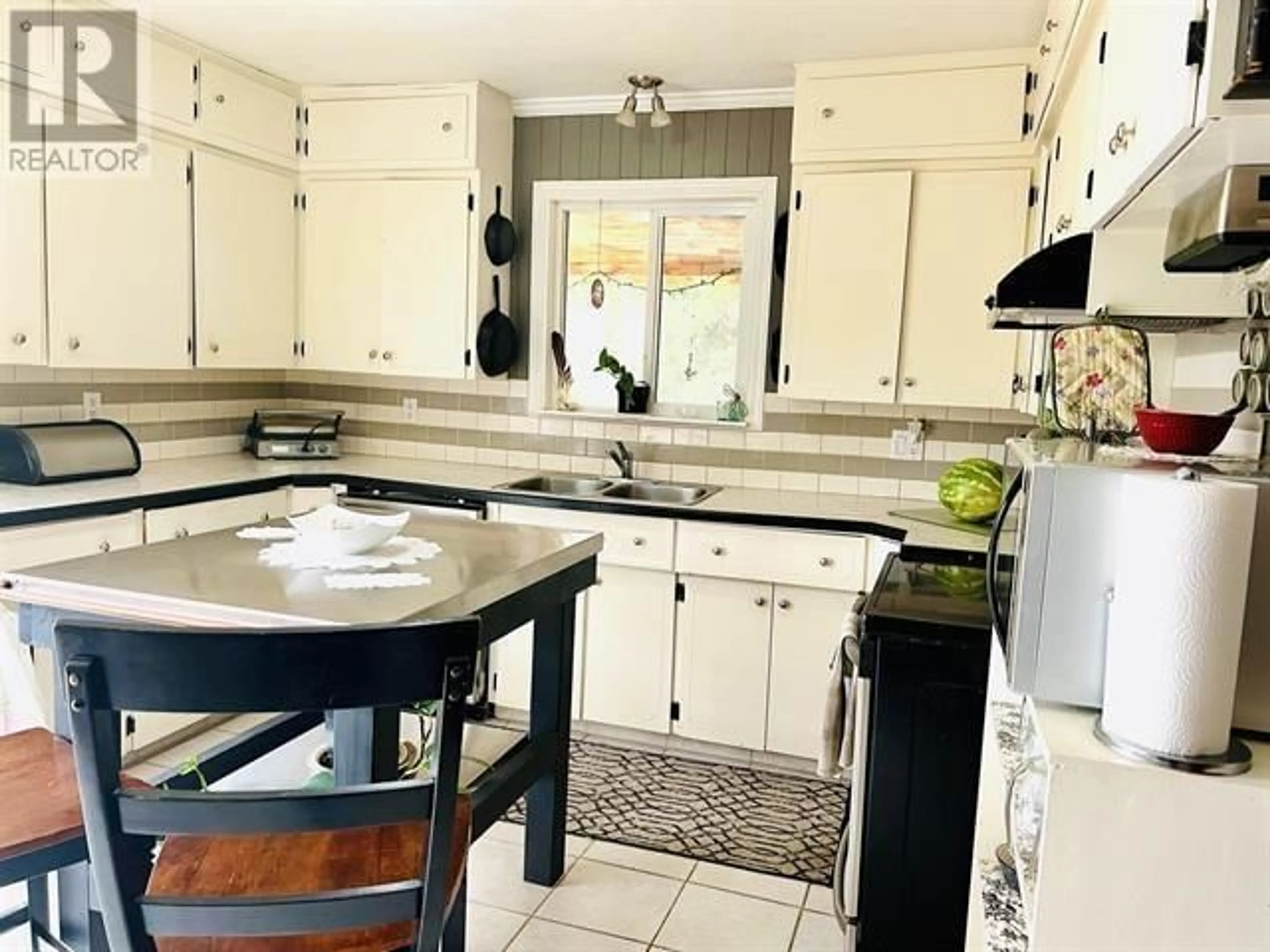 Open concept kitchen, ceramic/tile floor for 4509 SHAW DRIVE, Forest Grove British Columbia V0K1M0