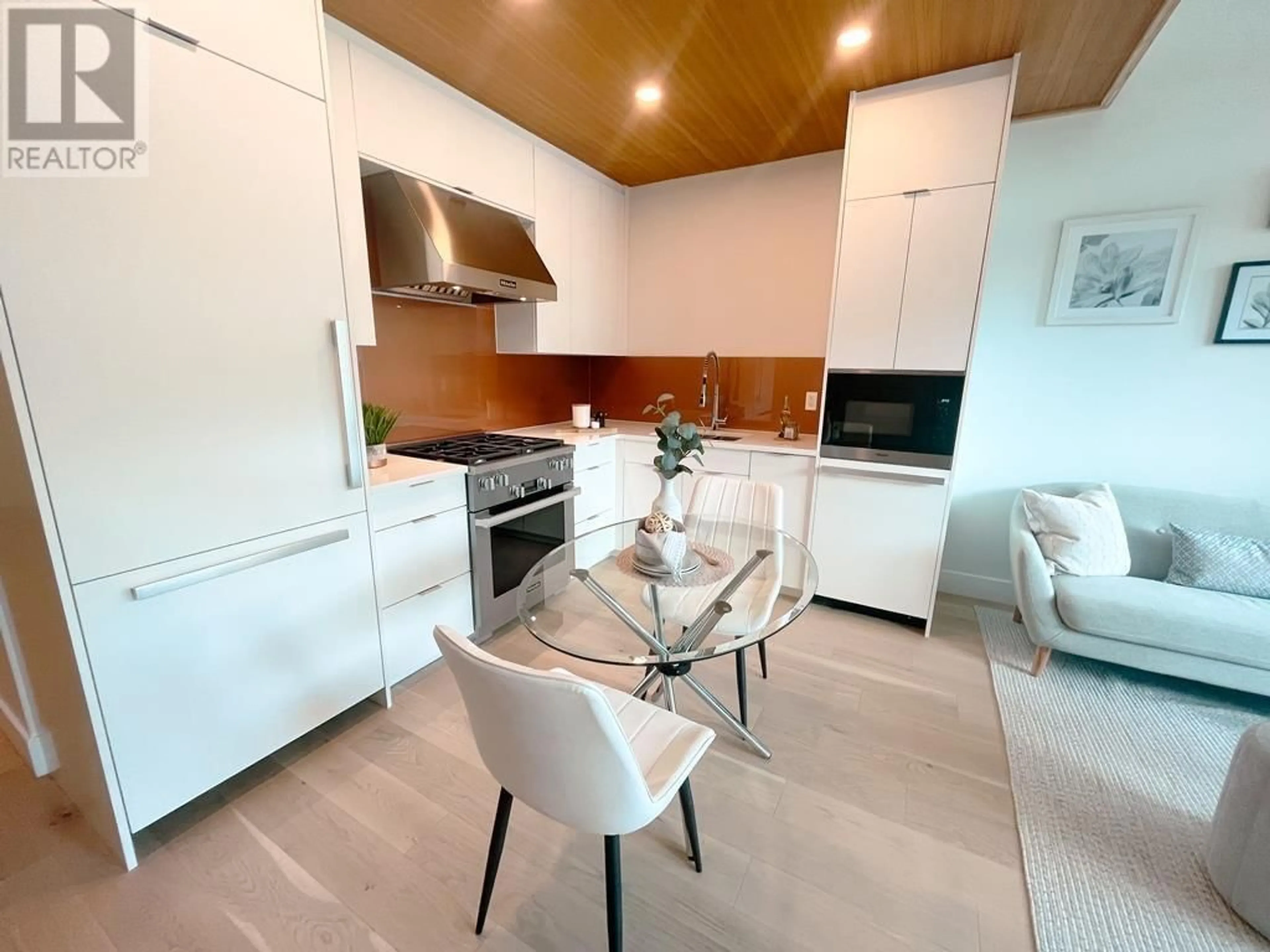 Contemporary kitchen, wood floors, cottage for 504 6687 NELSON AVENUE, West Vancouver British Columbia V7W2B2