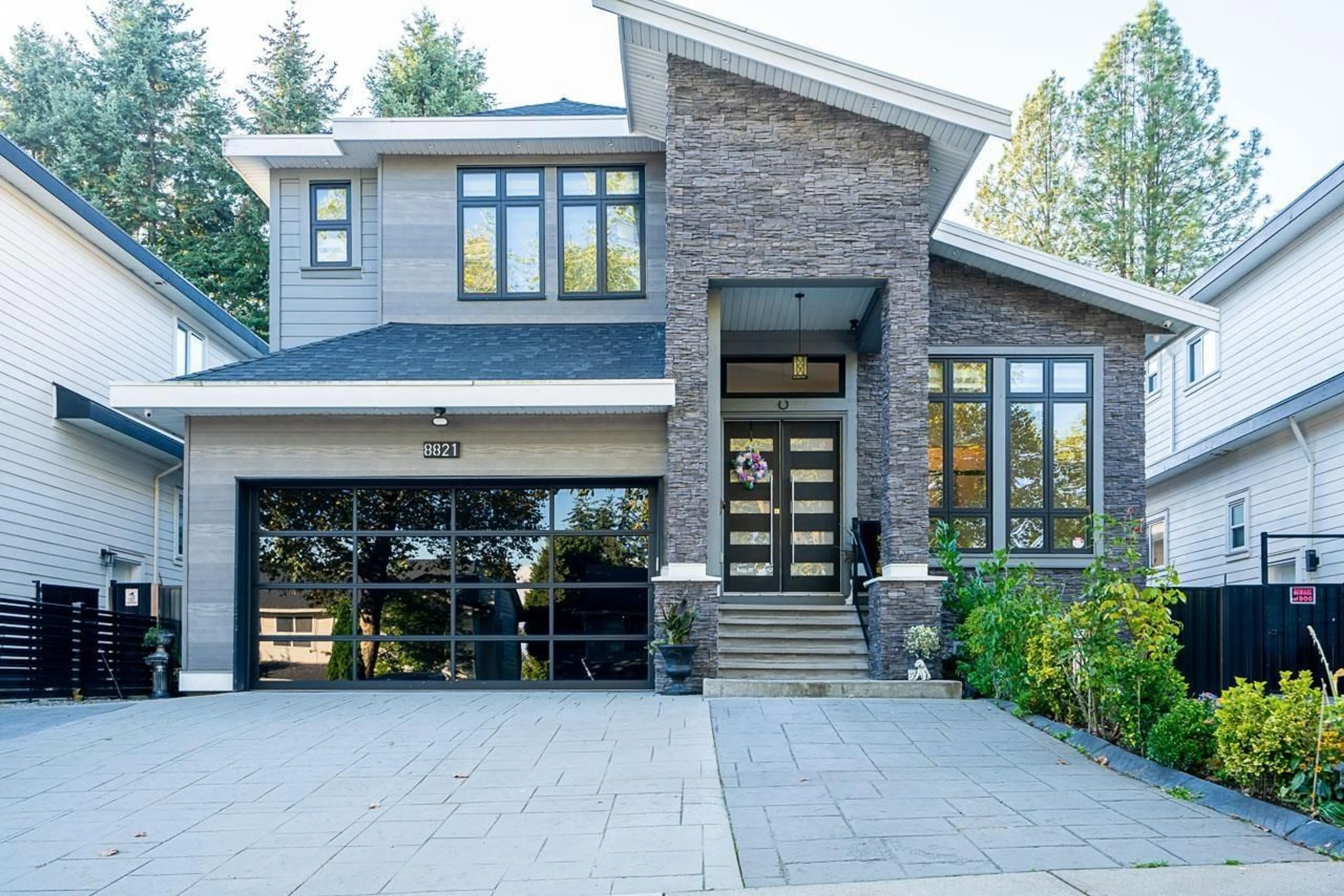 Home with brick exterior material for 8821 QUEEN MARY BOULEVARD, Surrey British Columbia V3V6P9