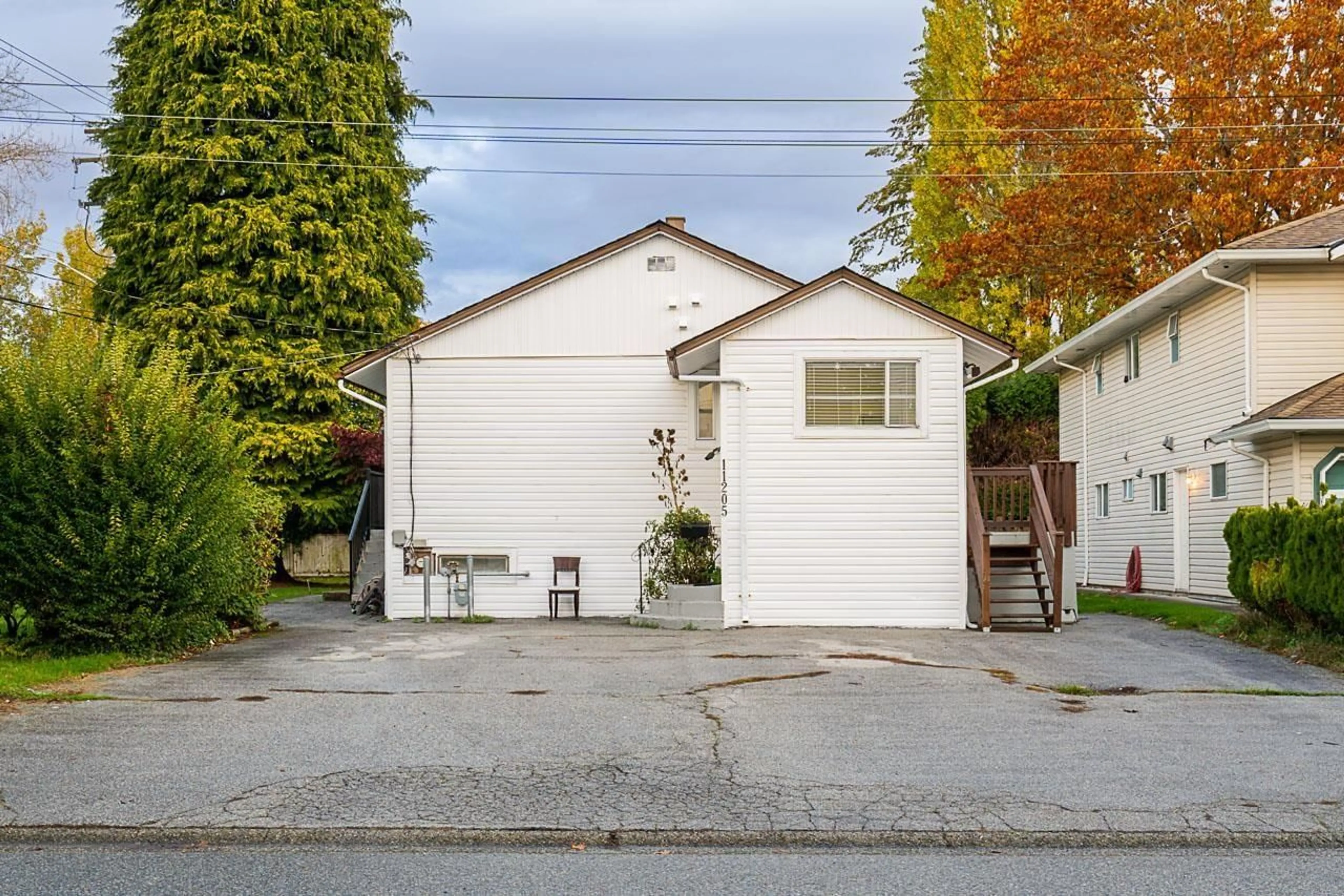 Frontside or backside of a home, the street view for 11205 78A AVENUE, Delta British Columbia V4C1P4