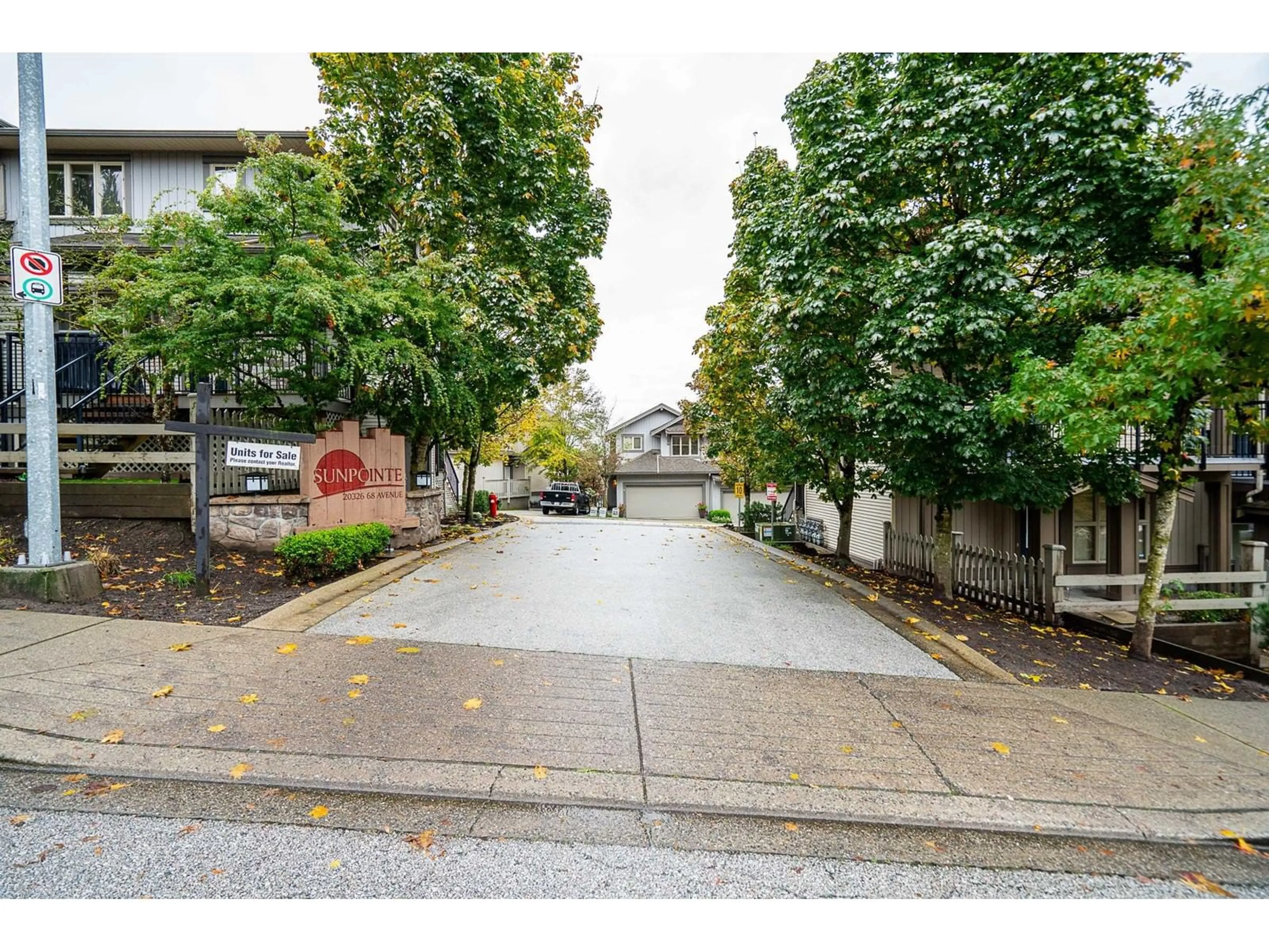 A pic from exterior of the house or condo, the street view for 13 20326 68 AVENUE, Langley British Columbia V2Y0E3