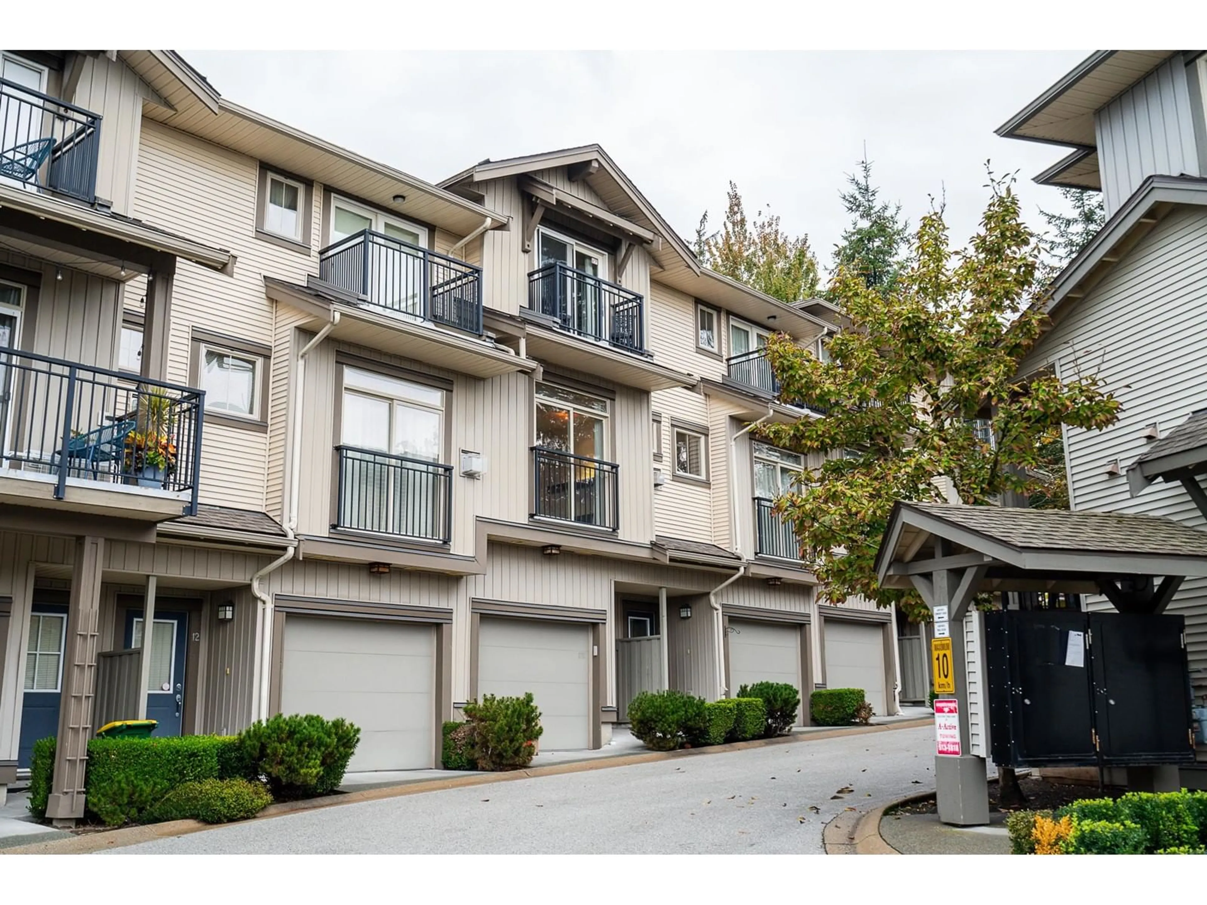 A pic from exterior of the house or condo, the street view for 13 20326 68 AVENUE, Langley British Columbia V2Y0E3