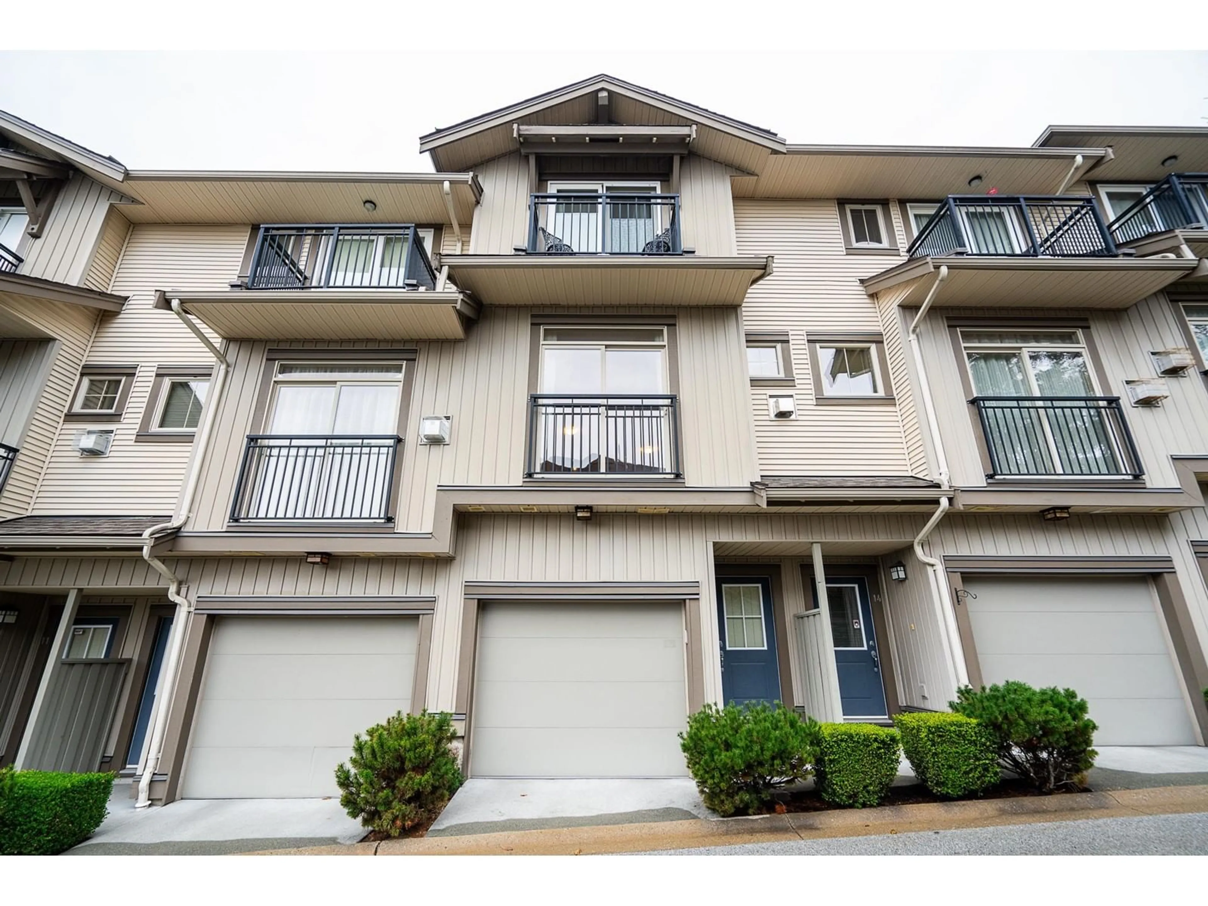 A pic from exterior of the house or condo, the street view for 13 20326 68 AVENUE, Langley British Columbia V2Y0E3