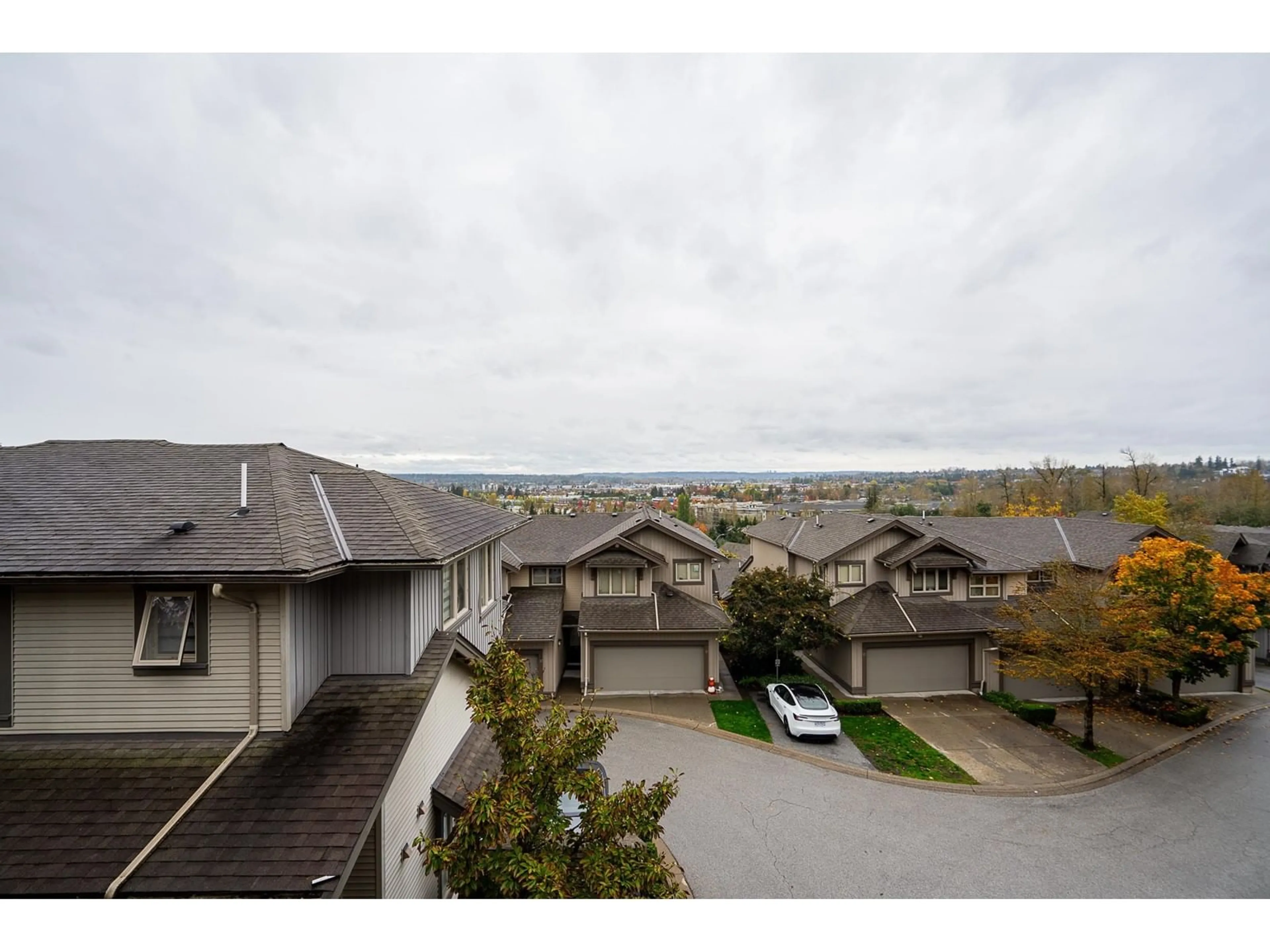 A pic from exterior of the house or condo, the street view for 13 20326 68 AVENUE, Langley British Columbia V2Y0E3