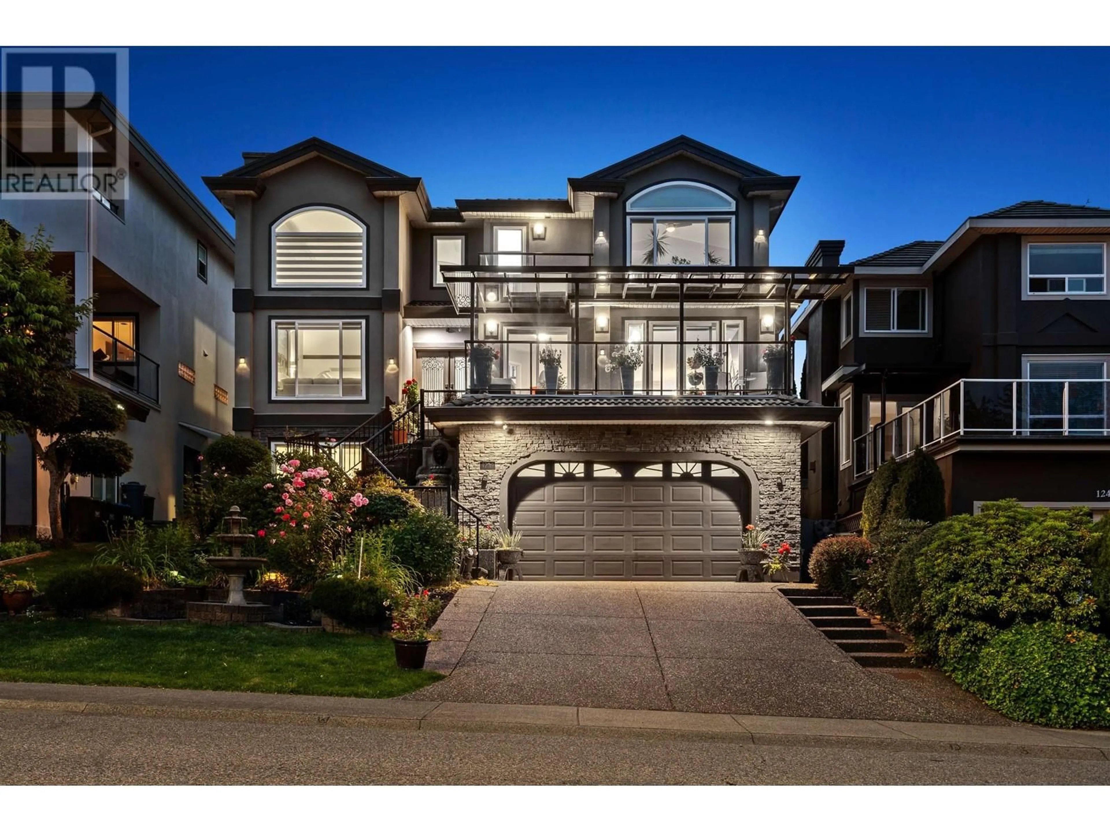 Frontside or backside of a home, the street view for 1239 CONFEDERATION DRIVE, Port Coquitlam British Columbia V3C6K2