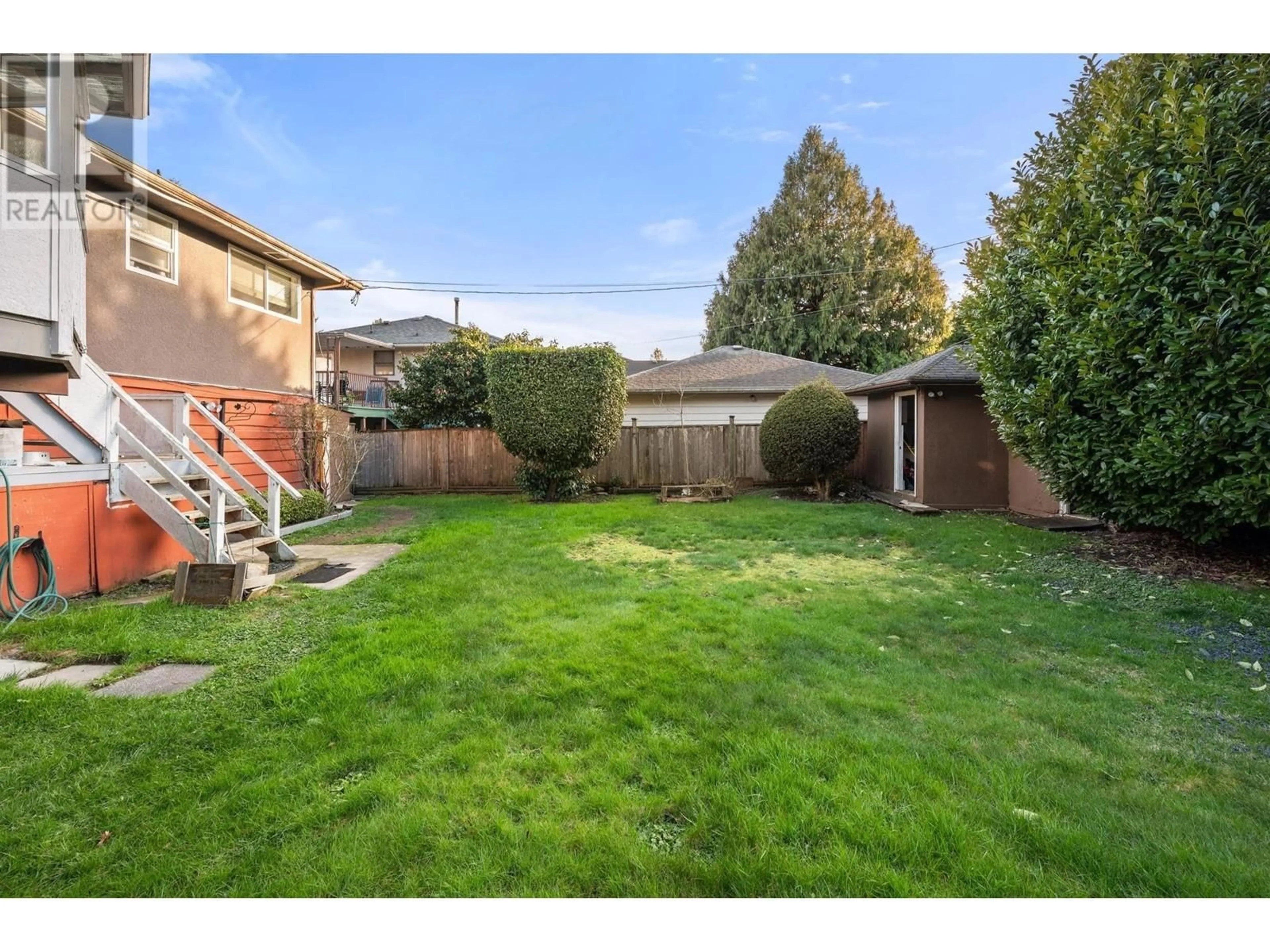 Frontside or backside of a home, the fenced backyard for 10091 AINSWORTH CRESCENT, Richmond British Columbia V7A3V3