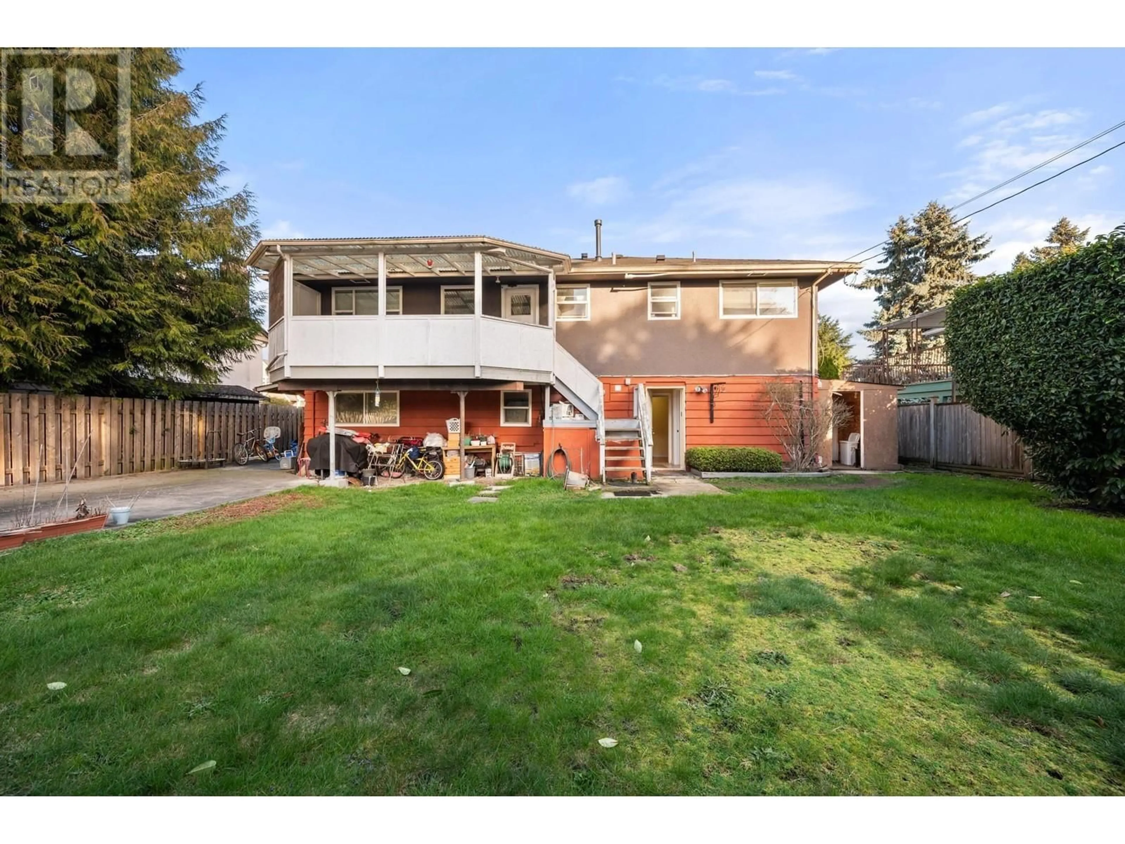 Frontside or backside of a home, the fenced backyard for 10091 AINSWORTH CRESCENT, Richmond British Columbia V7A3V3