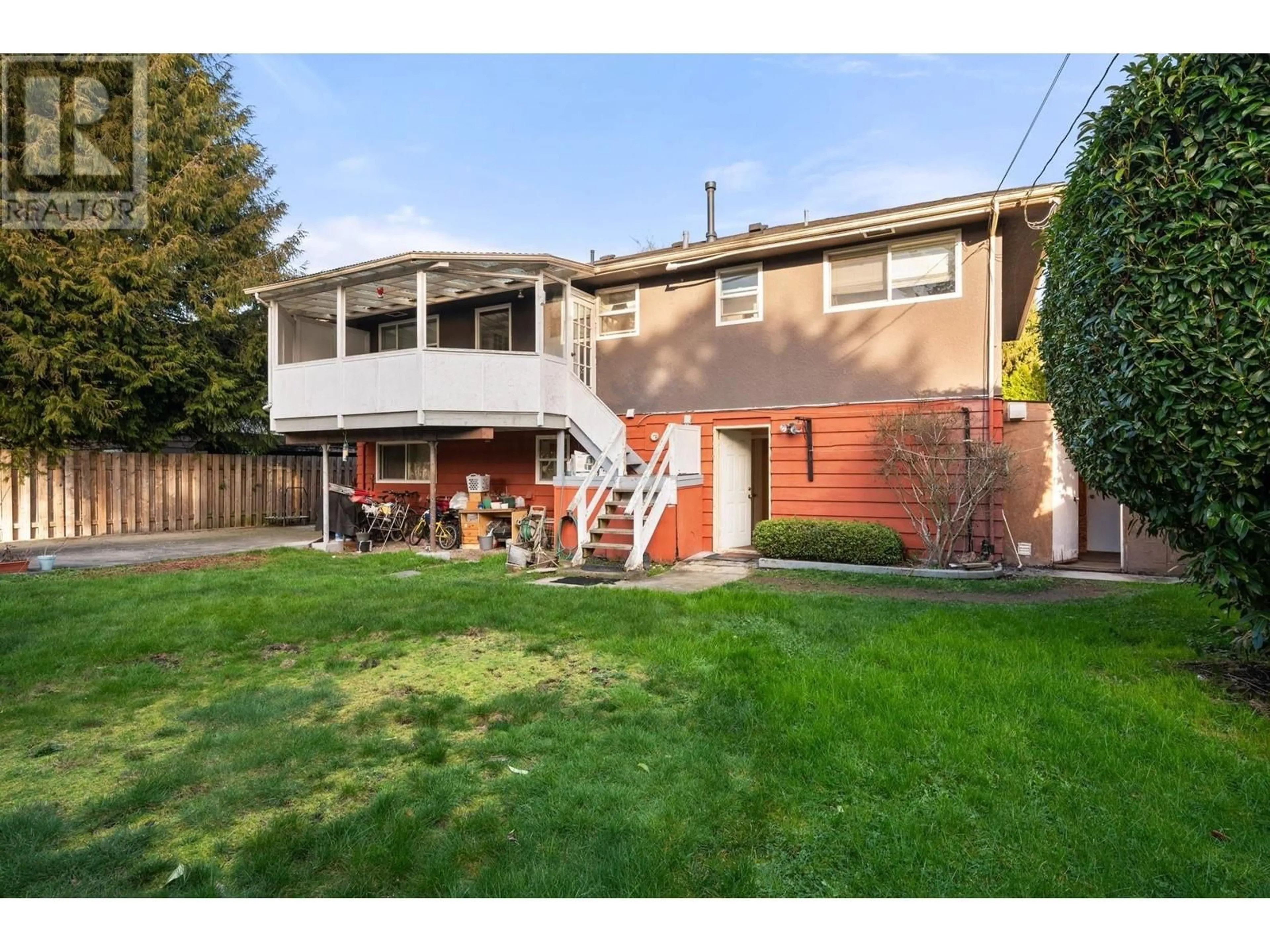 Frontside or backside of a home, the fenced backyard for 10091 AINSWORTH CRESCENT, Richmond British Columbia V7A3V3