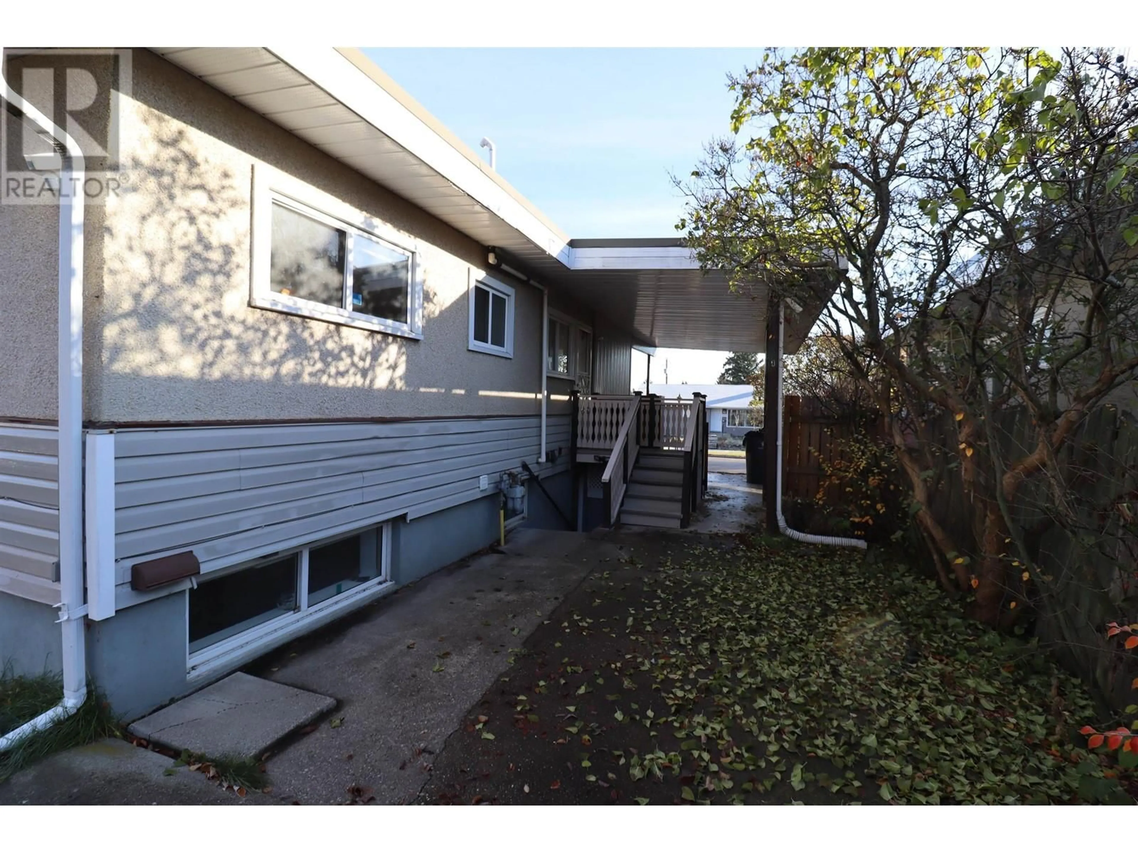 A pic from exterior of the house or condo, the fenced backyard for 1077 EWERT STREET, Prince George British Columbia V2M2P3