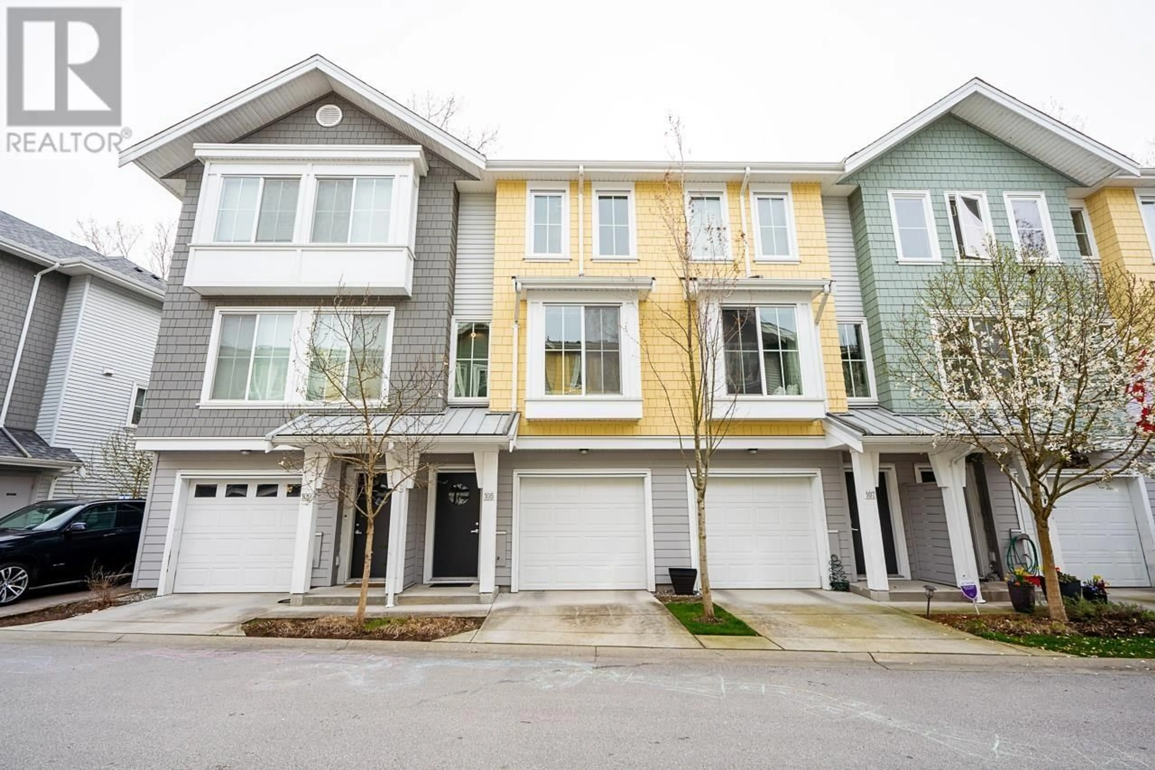 A pic from exterior of the house or condo, the street view for 108 5550 ADMIRAL WAY, Delta British Columbia V4K0C4