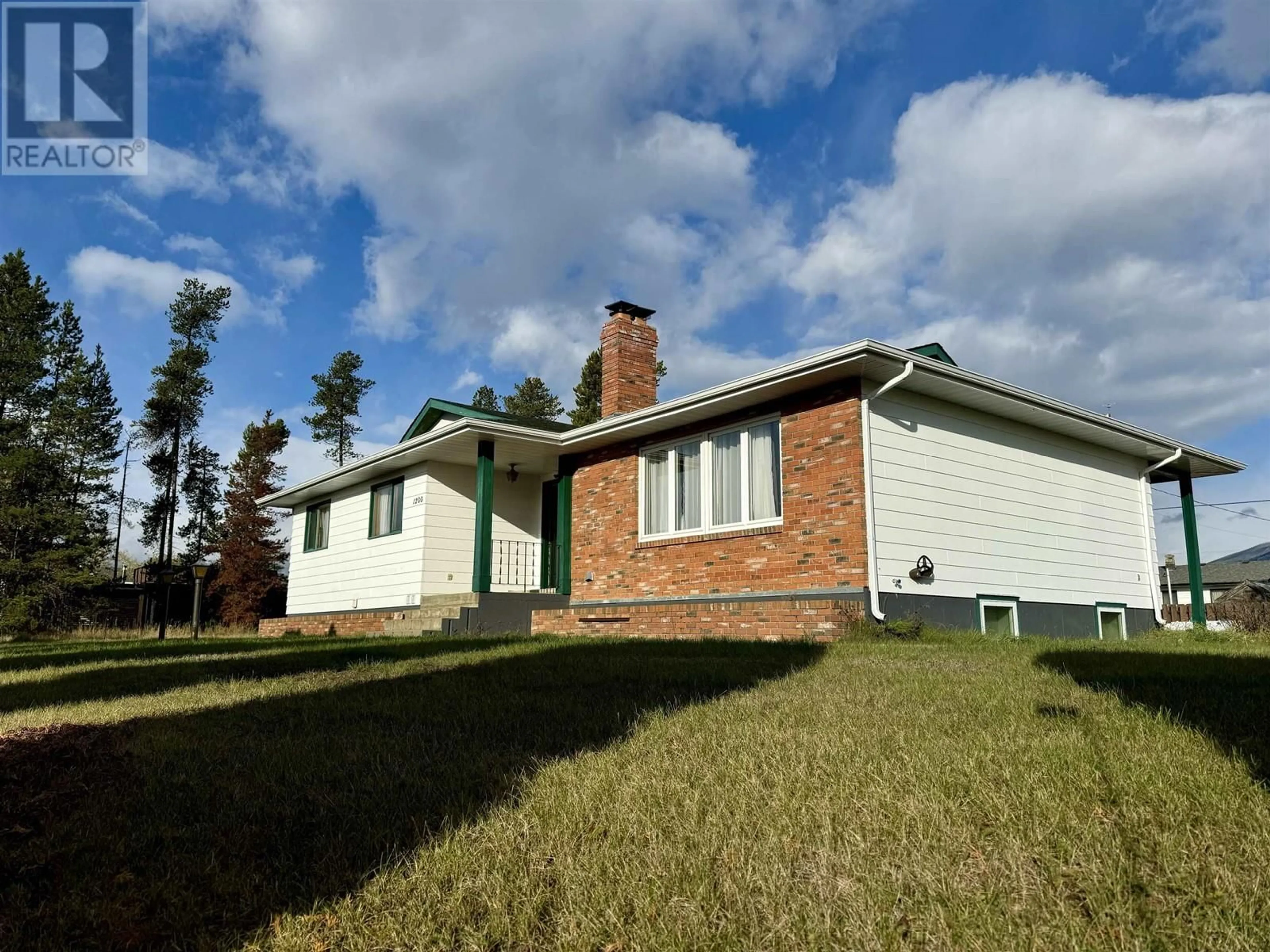 Frontside or backside of a home, cottage for 1200 9TH AVENUE, Valemount British Columbia V0E2Z0