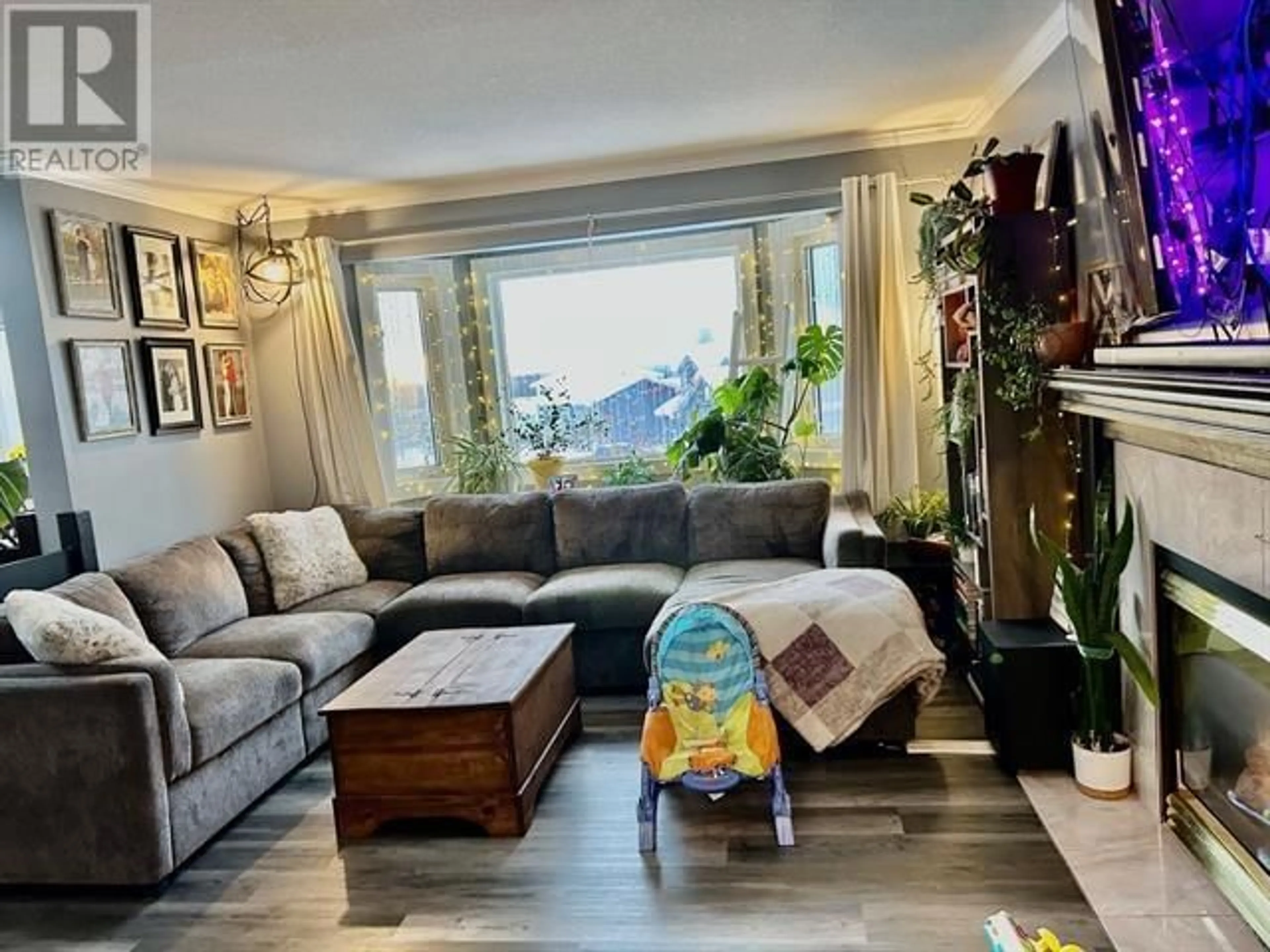 Living room, wood floors for 5604 MINNAKER CRESCENT, Fort Nelson British Columbia V0C1R0