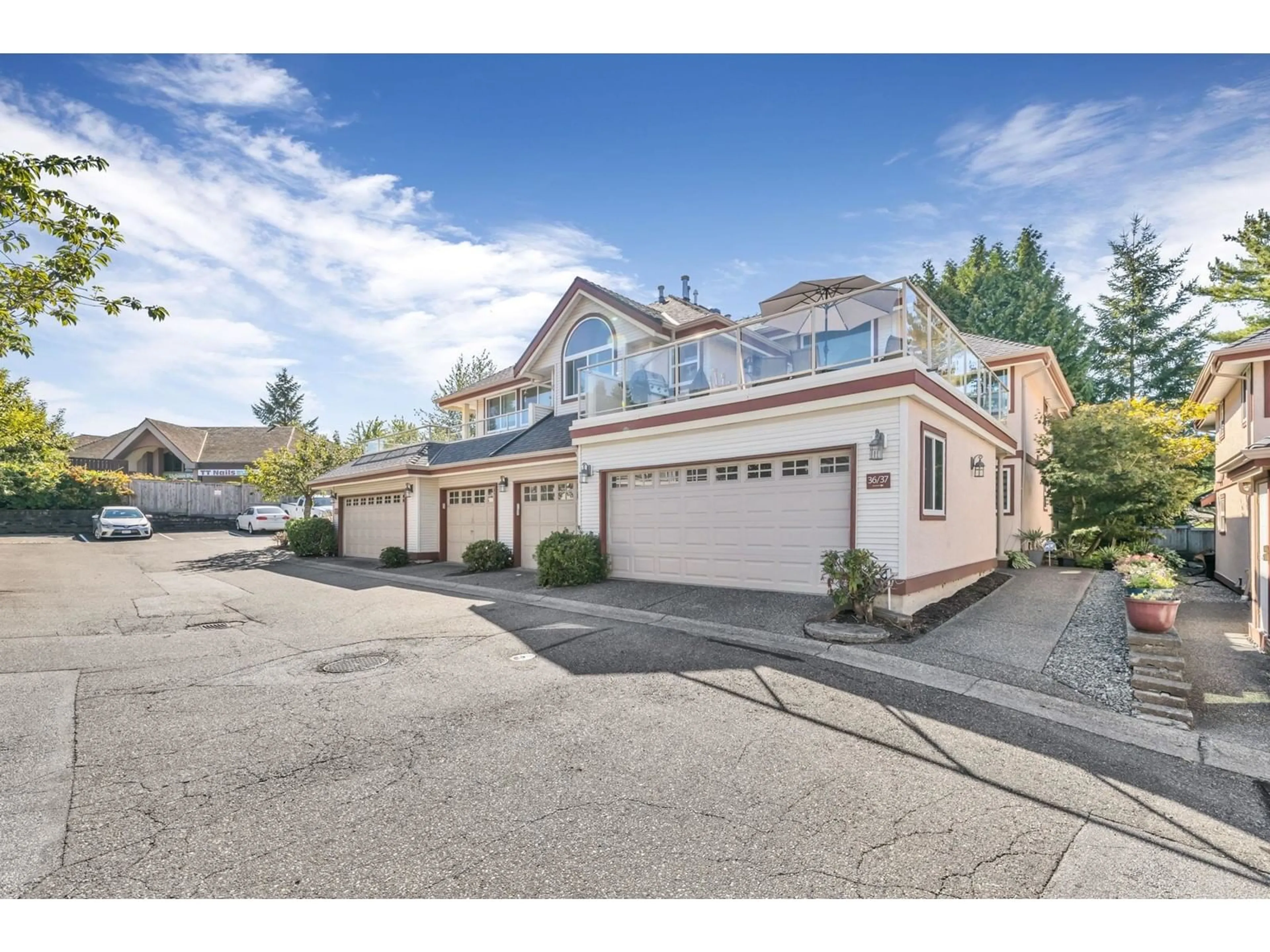 A pic from exterior of the house or condo, the street view for 36 8855 212 STREET, Langley British Columbia V1M2G8