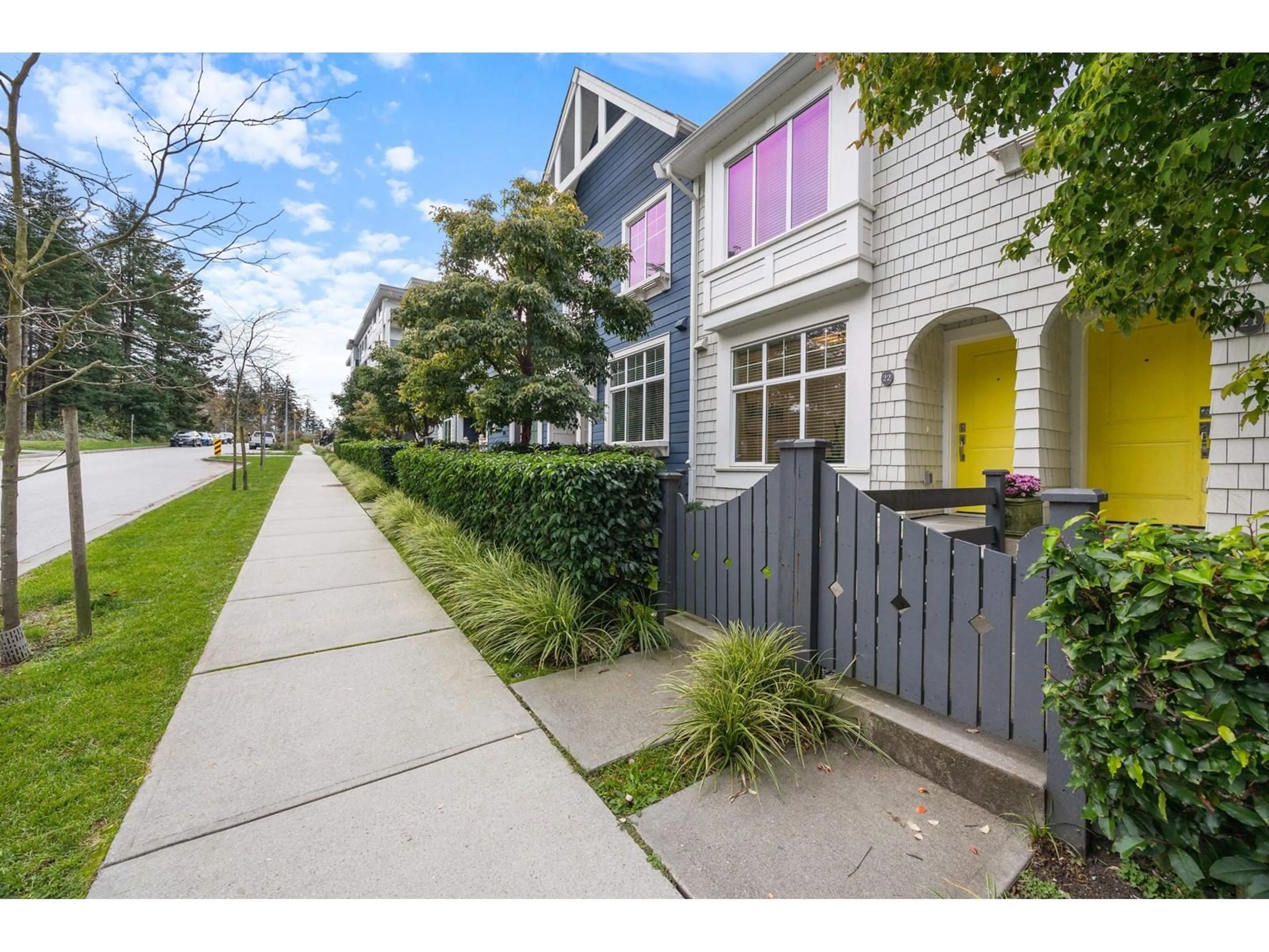 A pic from exterior of the house or condo, the fenced backyard for 22 16678 25 AVENUE, Surrey British Columbia V3Z0Z2