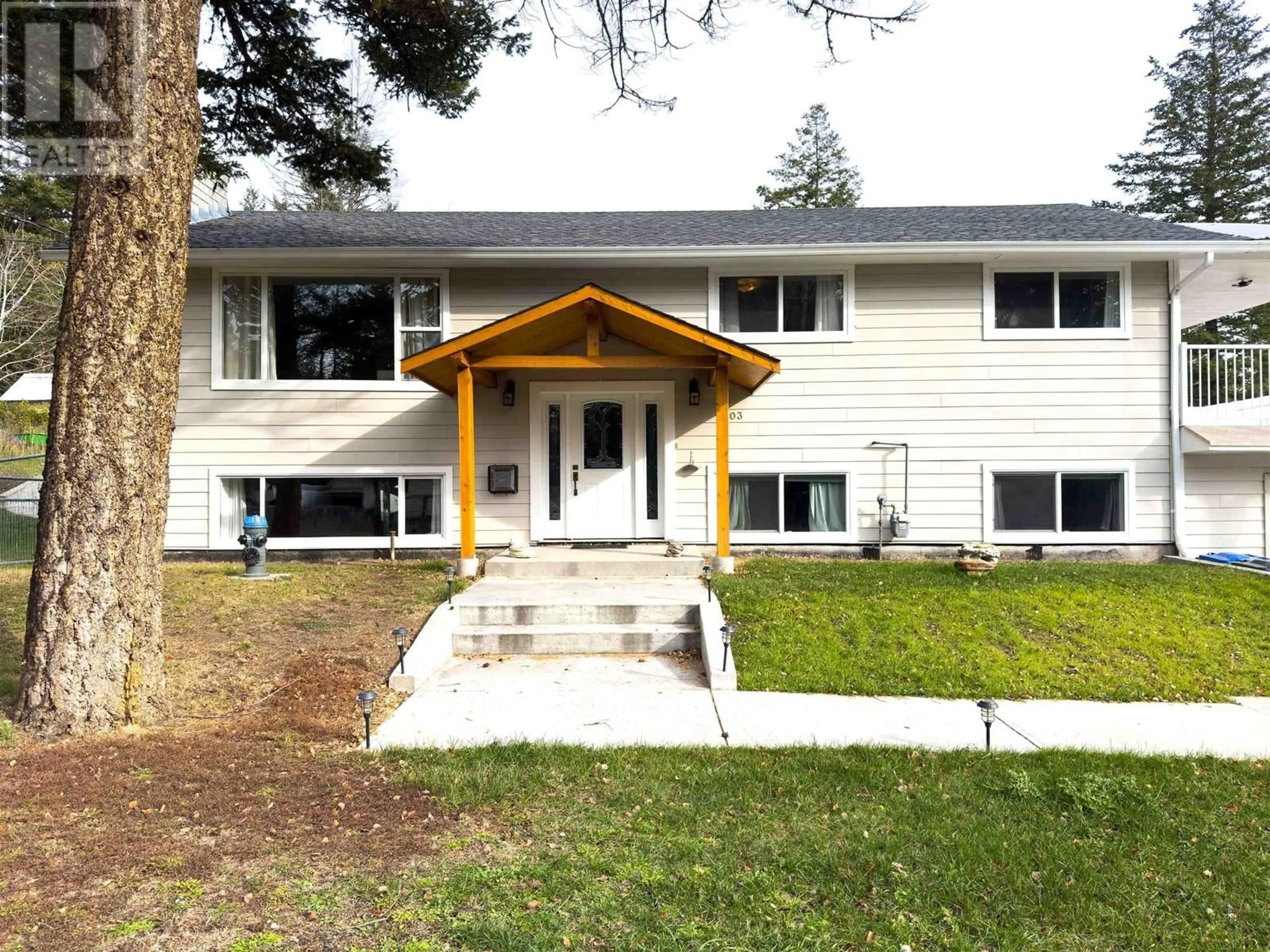Home with vinyl exterior material, street for 5003 SMITH ROAD, 108 Mile Ranch British Columbia V0K2Z0